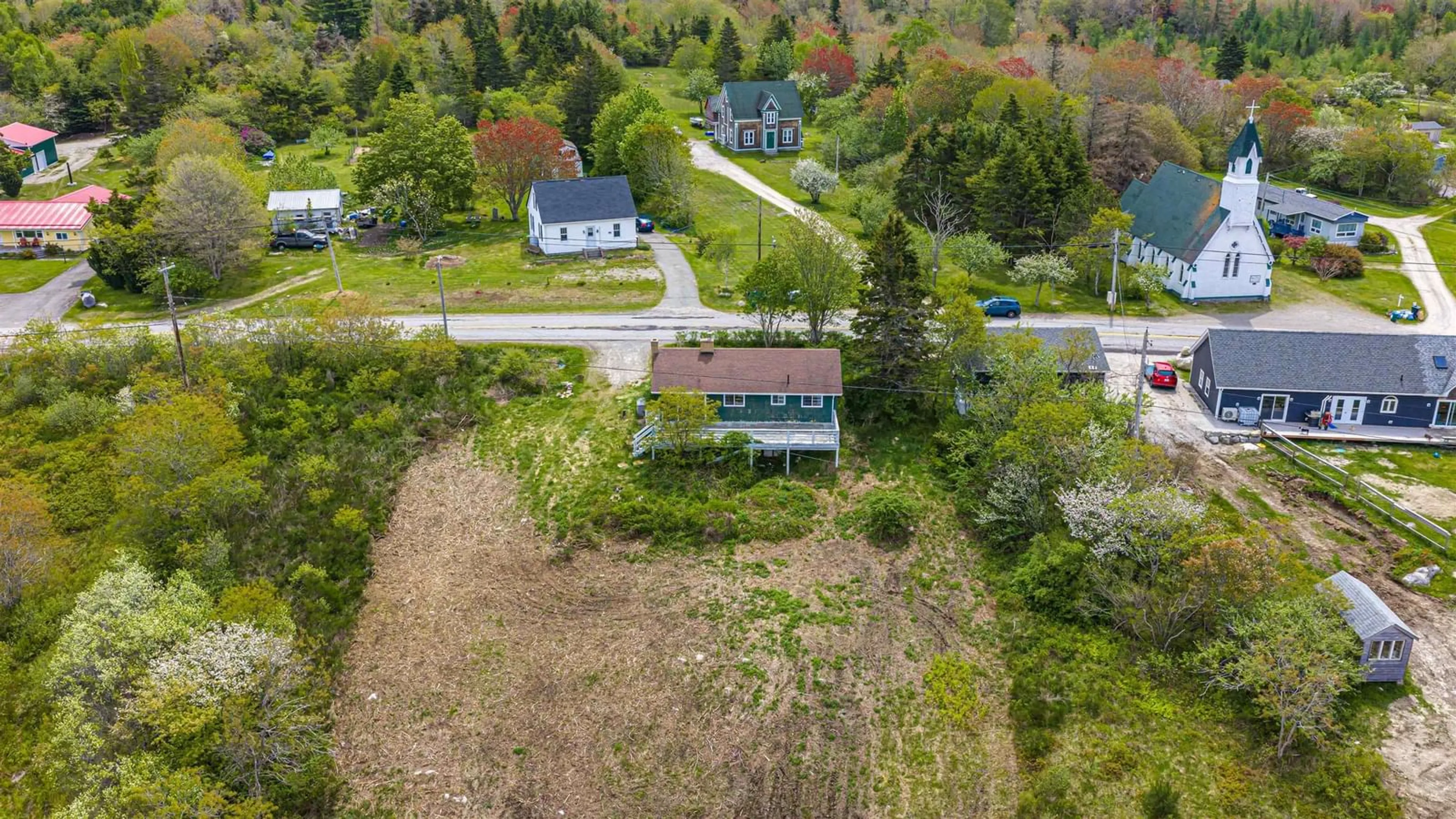A pic from outside/outdoor area/front of a property/back of a property/a pic from drone, street for 1166 Sandy Point Rd, Shelburne Nova Scotia B0T 1W0