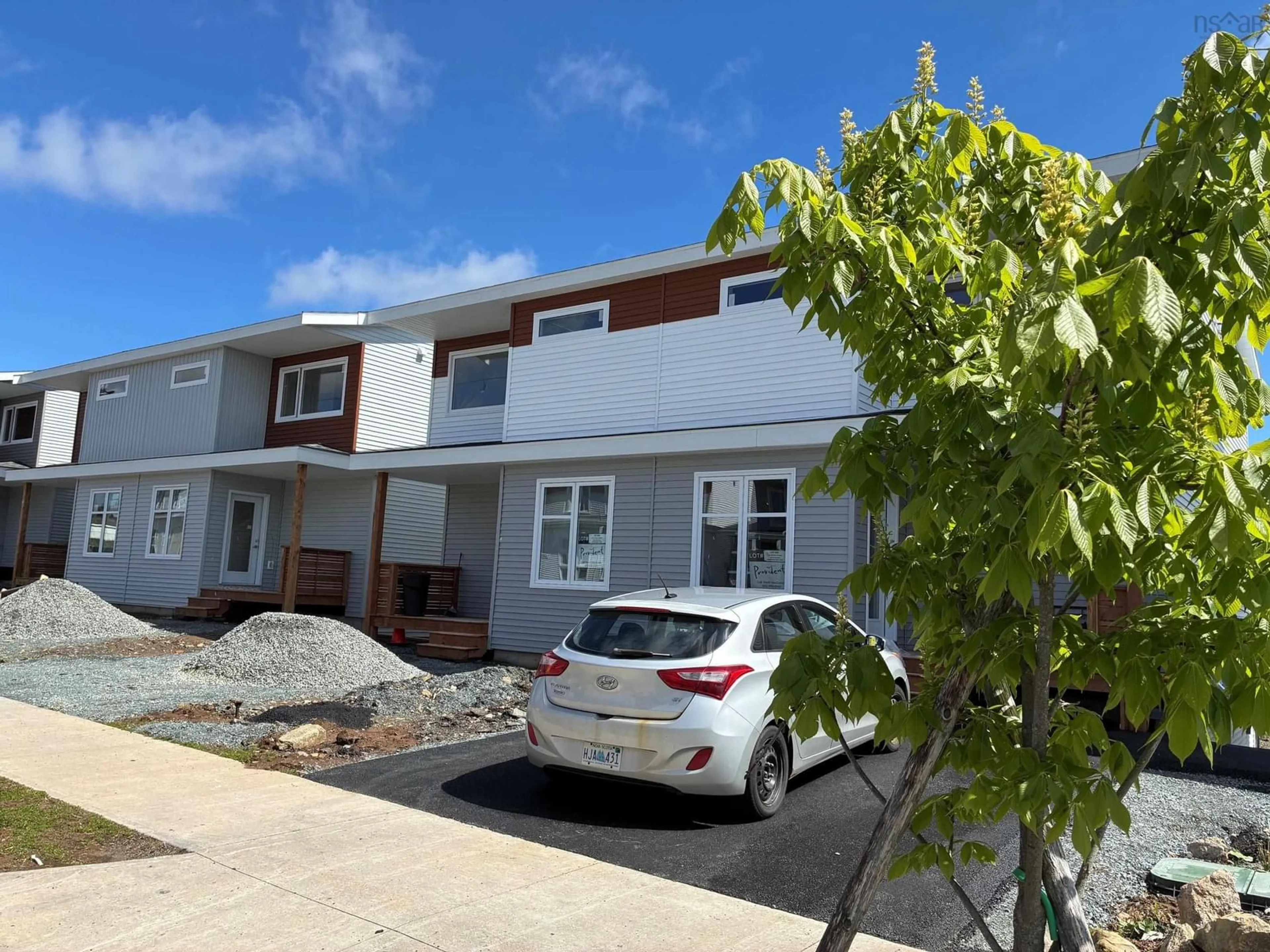 A pic from outside/outdoor area/front of a property/back of a property/a pic from drone, street for 34 Berm St, Spryfield Nova Scotia B3R 0H2