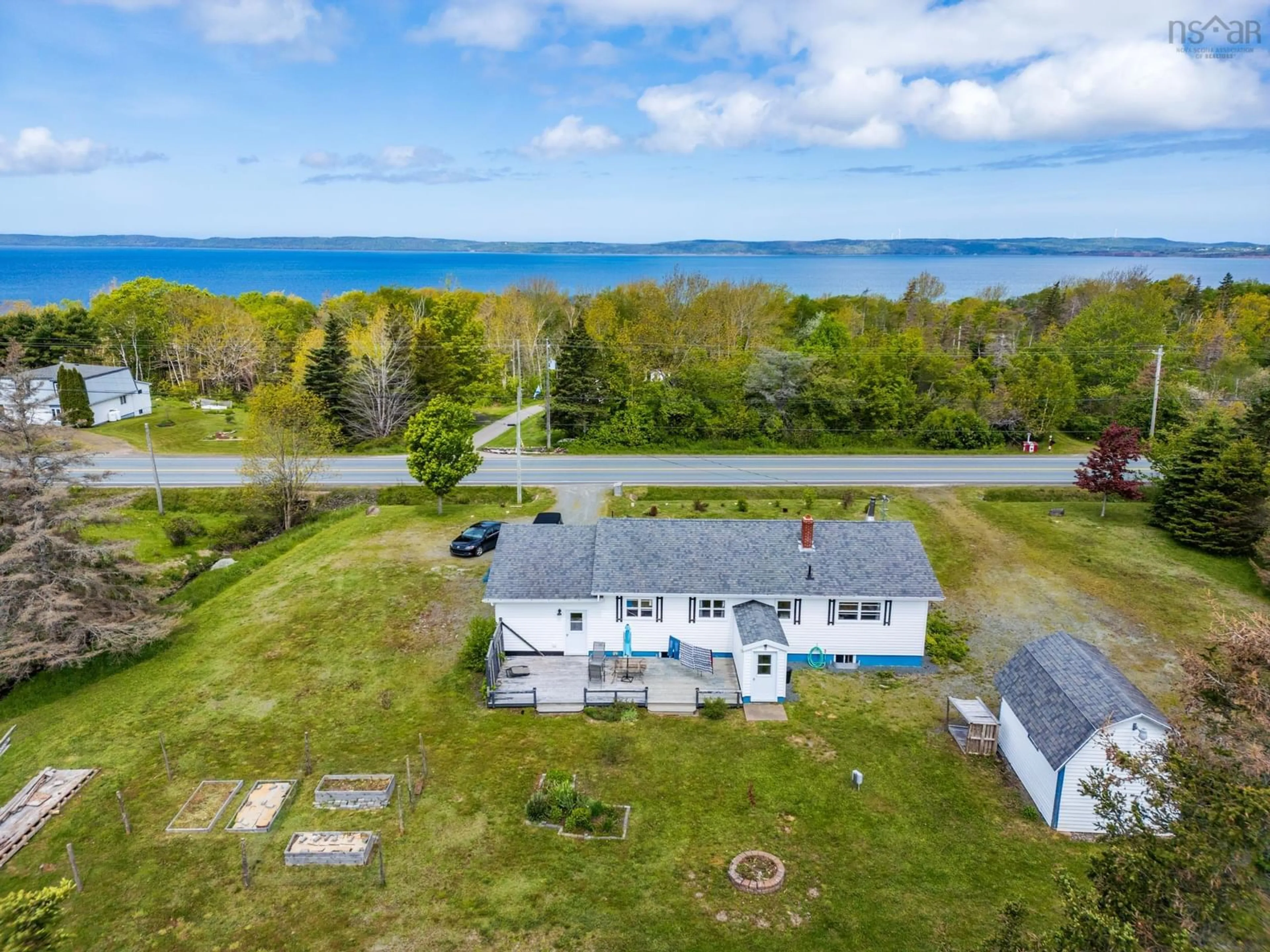 A pic from outside/outdoor area/front of a property/back of a property/a pic from drone, water/lake/river/ocean view for 7784 Highway 101, Plympton Nova Scotia B0W 2R0