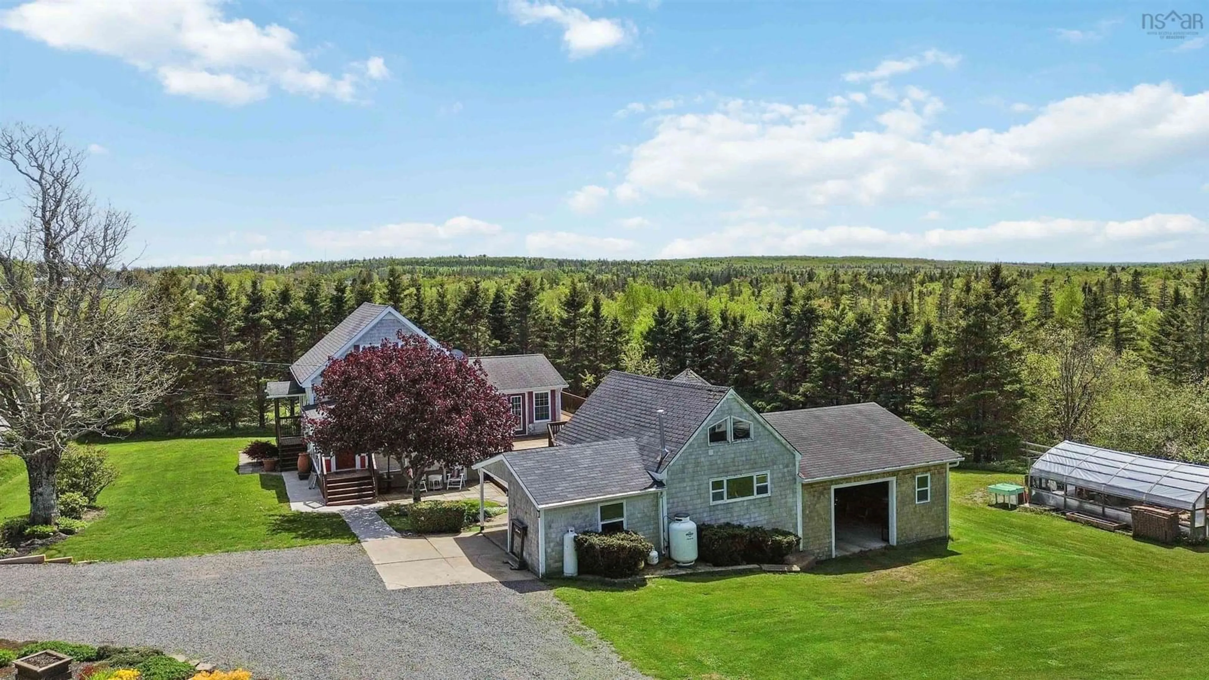 A pic from outside/outdoor area/front of a property/back of a property/a pic from drone, mountain view for 4535 Highway 358, South Scots Bay Nova Scotia B0P 1H0