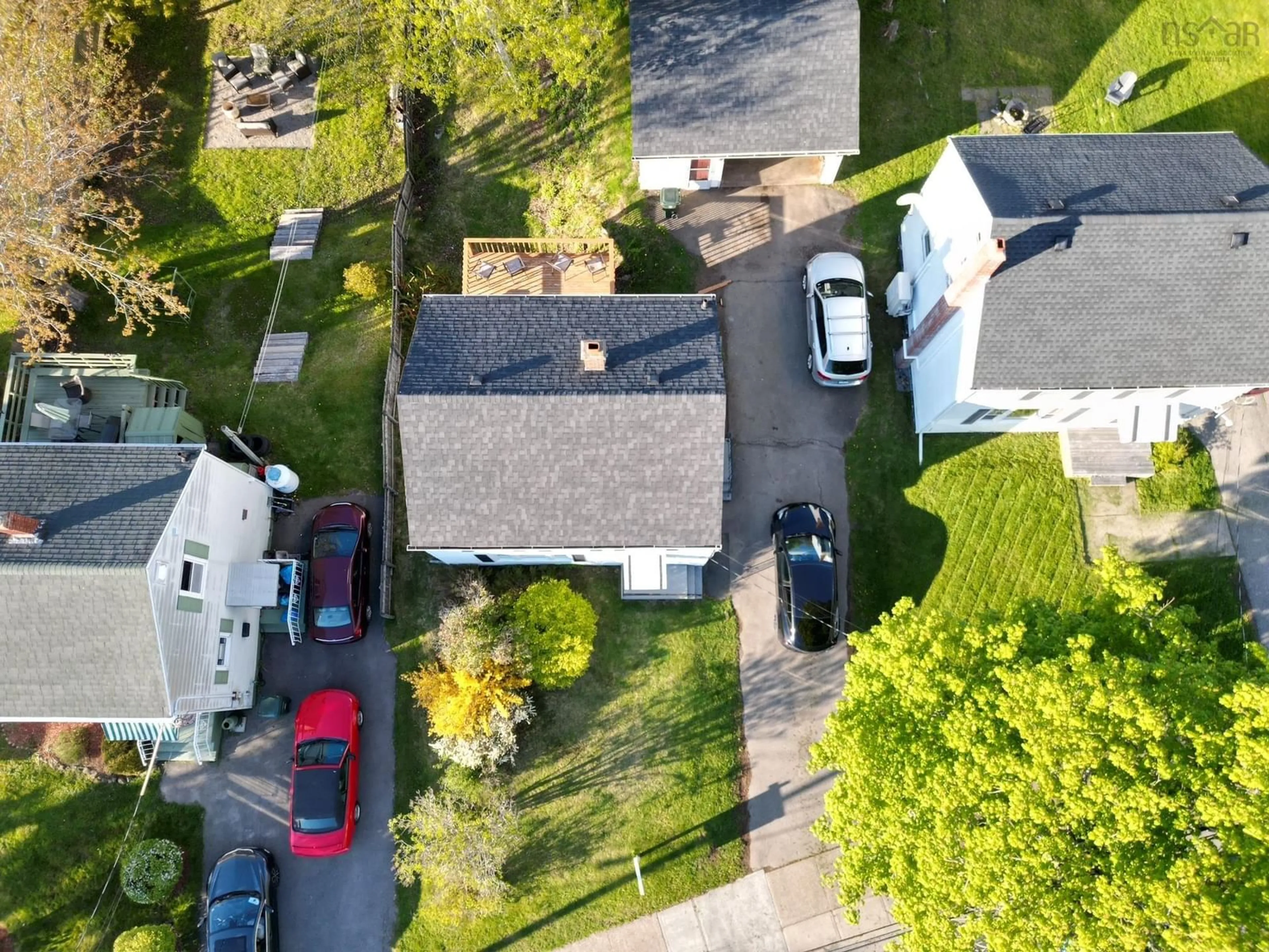A pic from outside/outdoor area/front of a property/back of a property/a pic from drone, street for 215 Cottage Rd, Sydney Nova Scotia B1P 2E7
