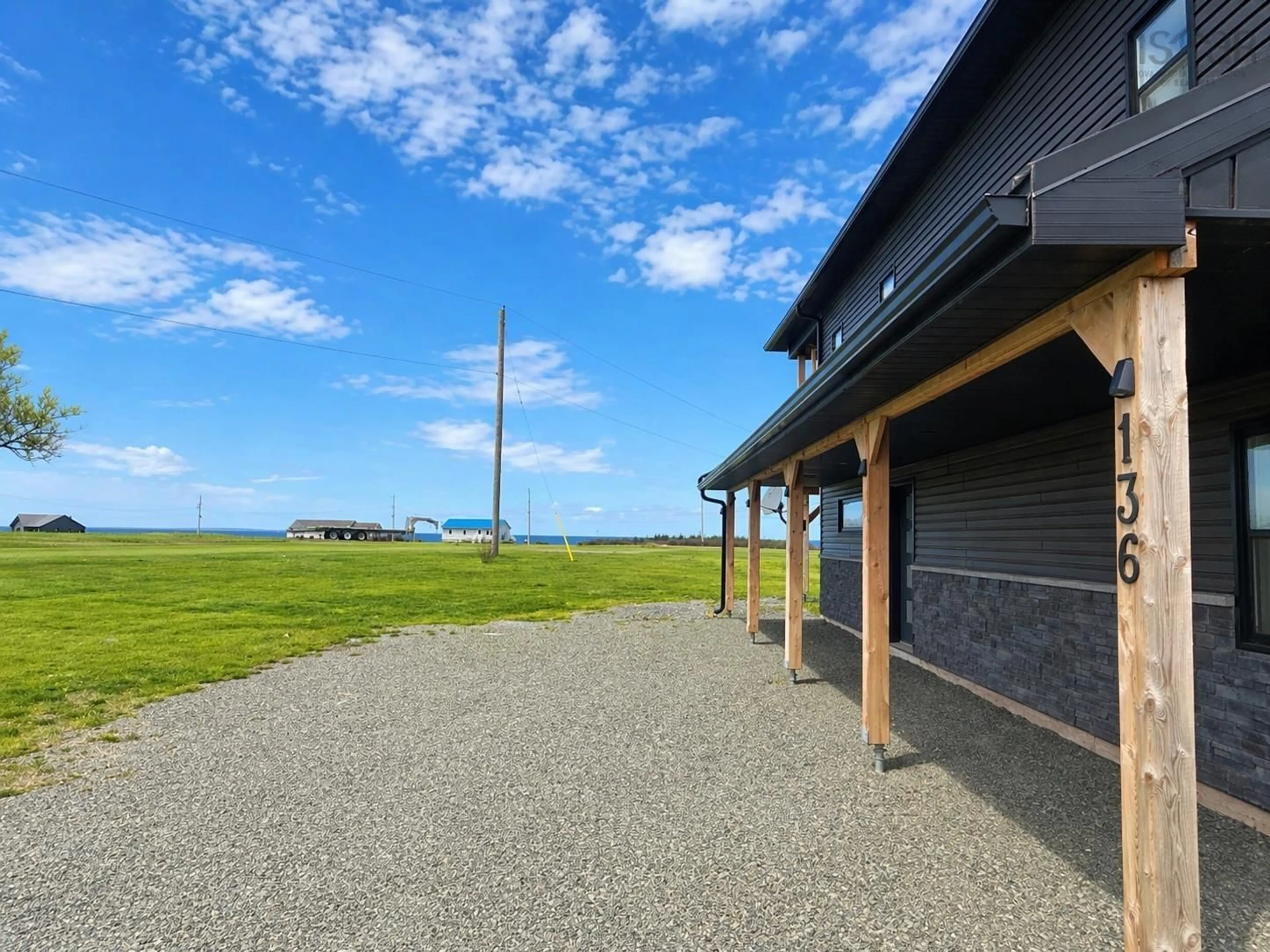 A pic from outside/outdoor area/front of a property/back of a property/a pic from drone, building for 136 Thompson Dr, Ponds Nova Scotia B0K 1G0