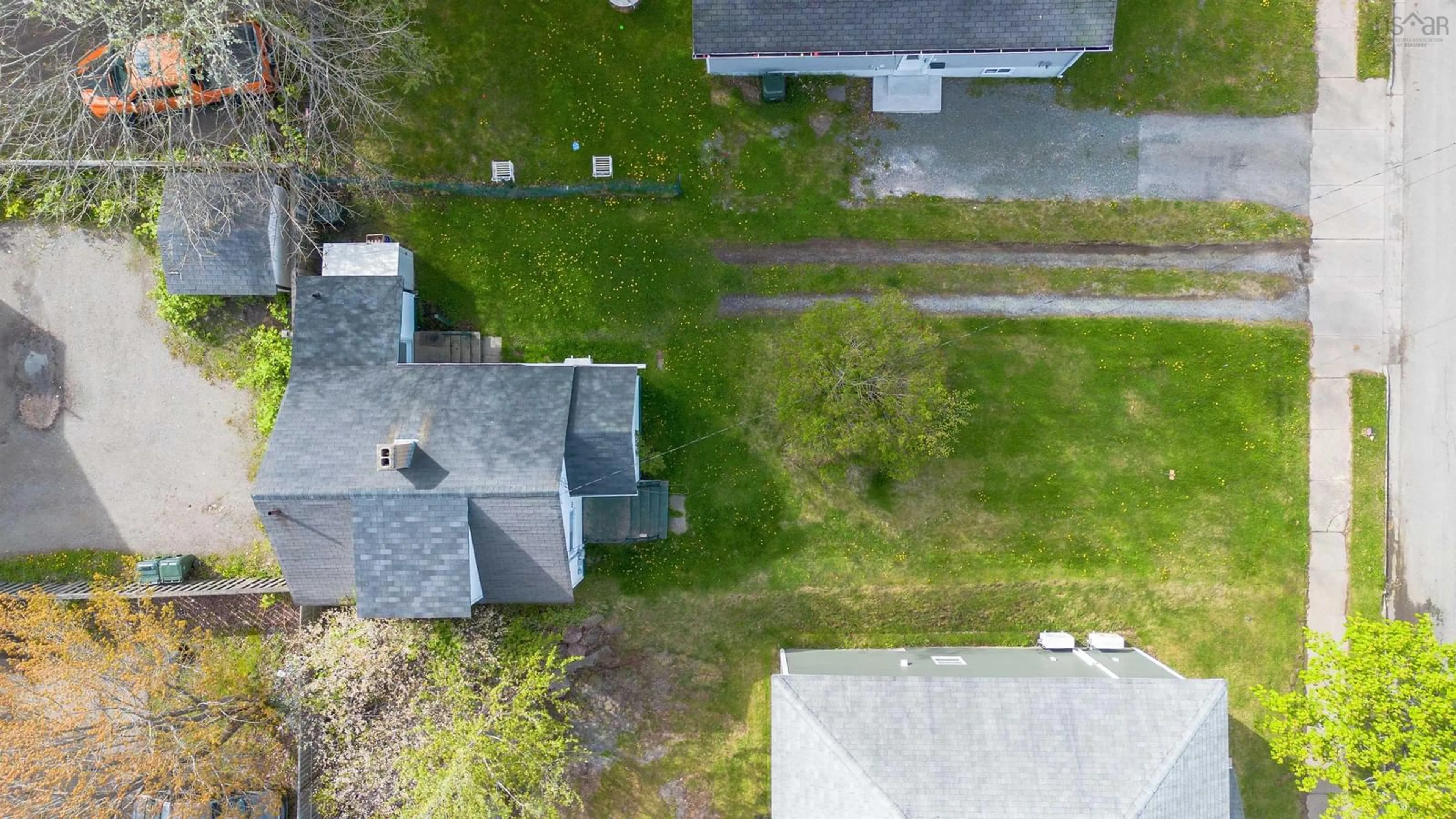 A pic from outside/outdoor area/front of a property/back of a property/a pic from drone, street for 70 Fairview St, Sydney Nova Scotia B1P 1R3