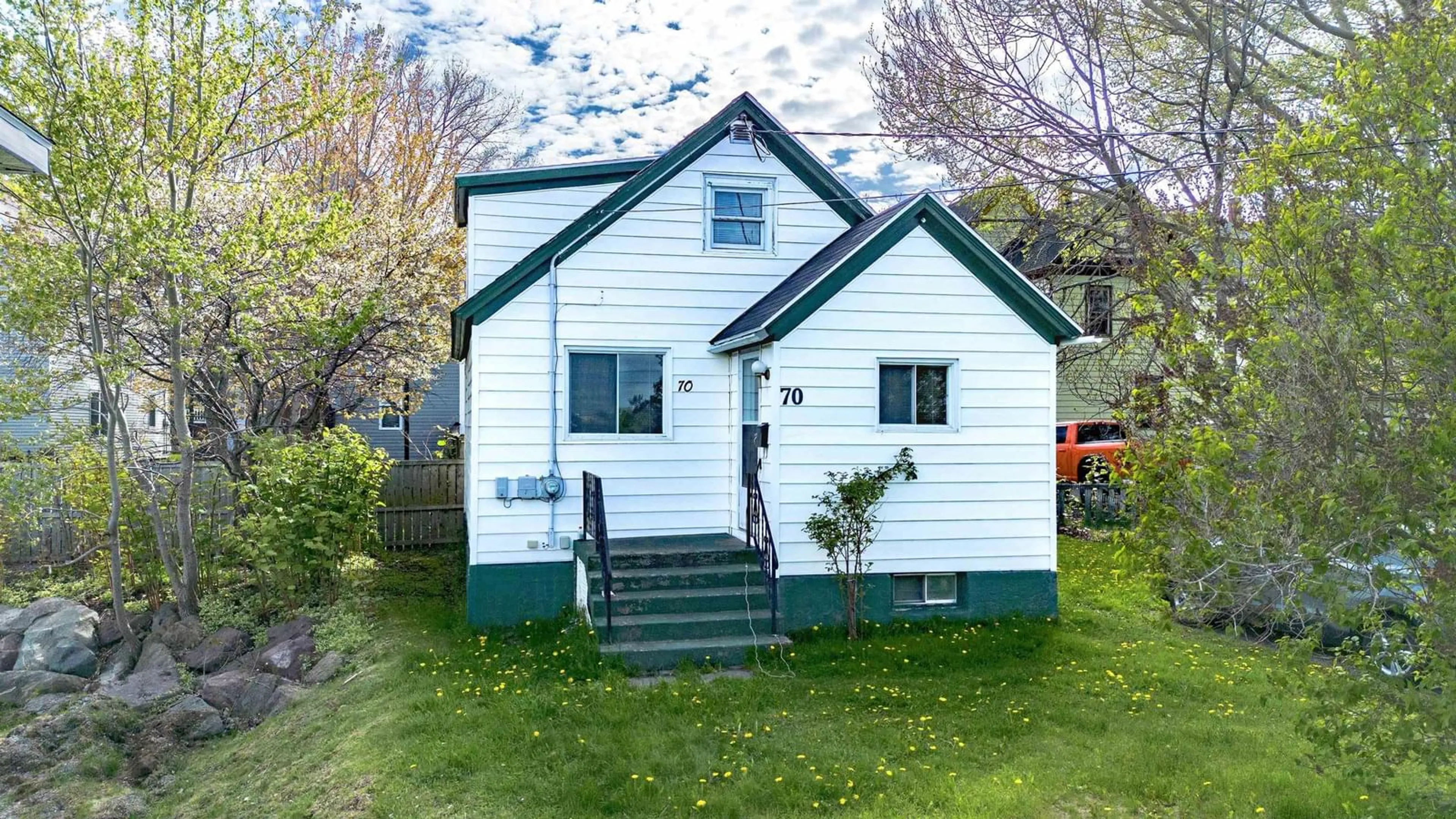 Home with vinyl exterior material, street for 70 Fairview St, Sydney Nova Scotia B1P 1R3