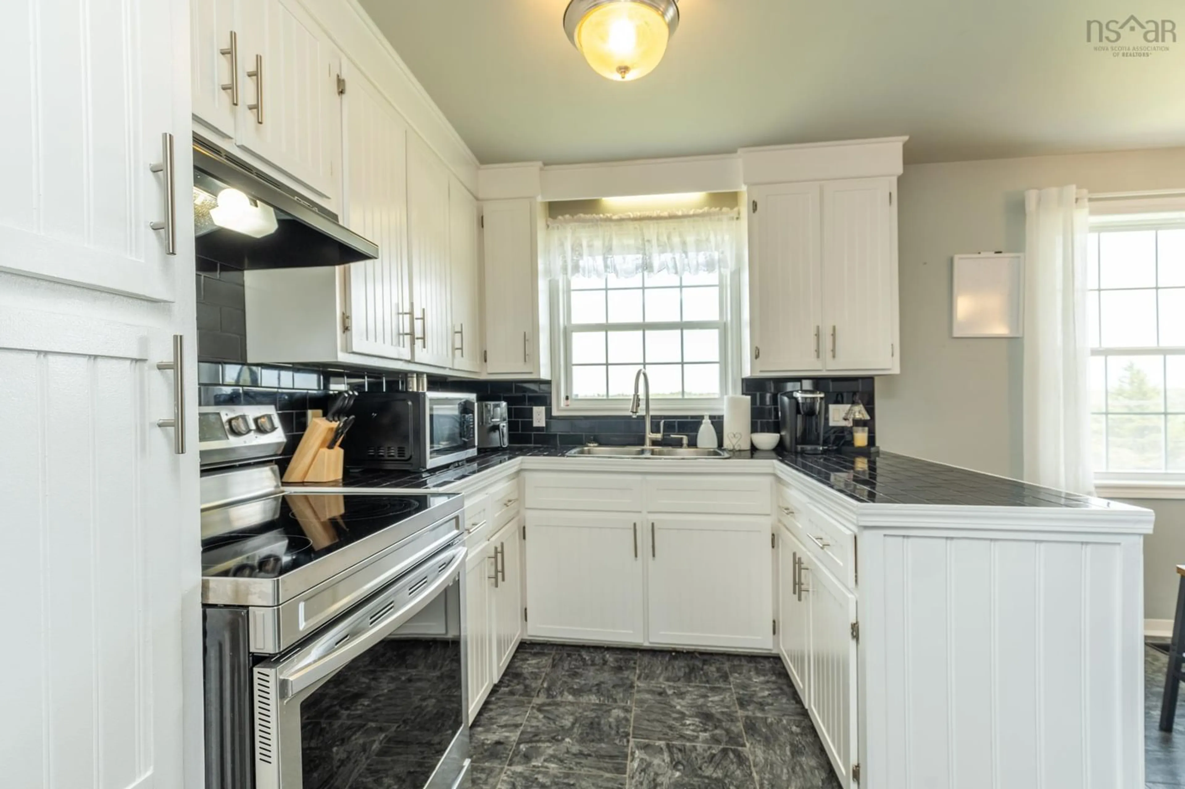 Standard kitchen, ceramic/tile floor for 1331 Main Shore Road, Sandford Nova Scotia B5A 5K8