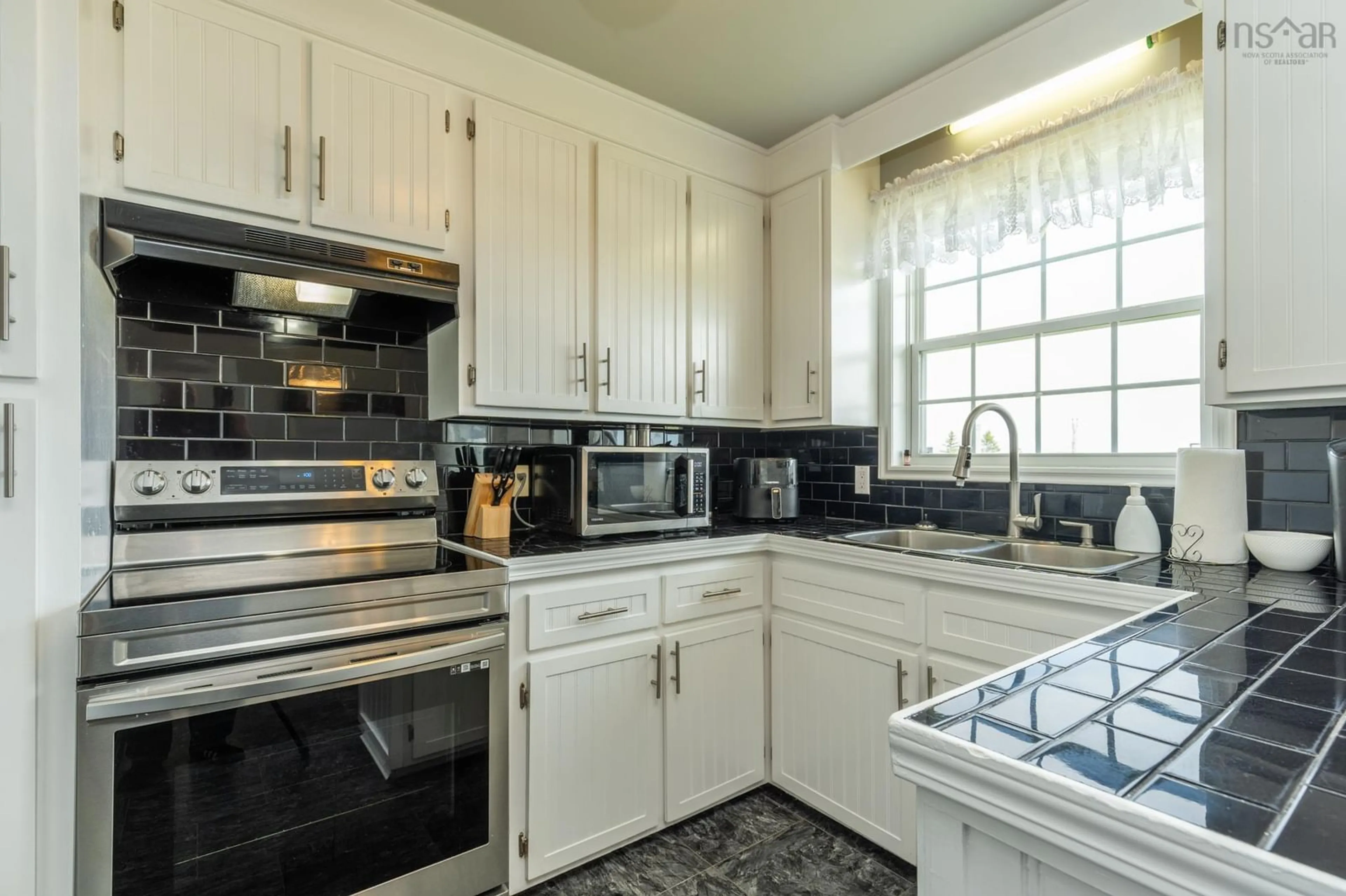 Standard kitchen, ceramic/tile floor for 1331 Main Shore Road, Sandford Nova Scotia B5A 5K8
