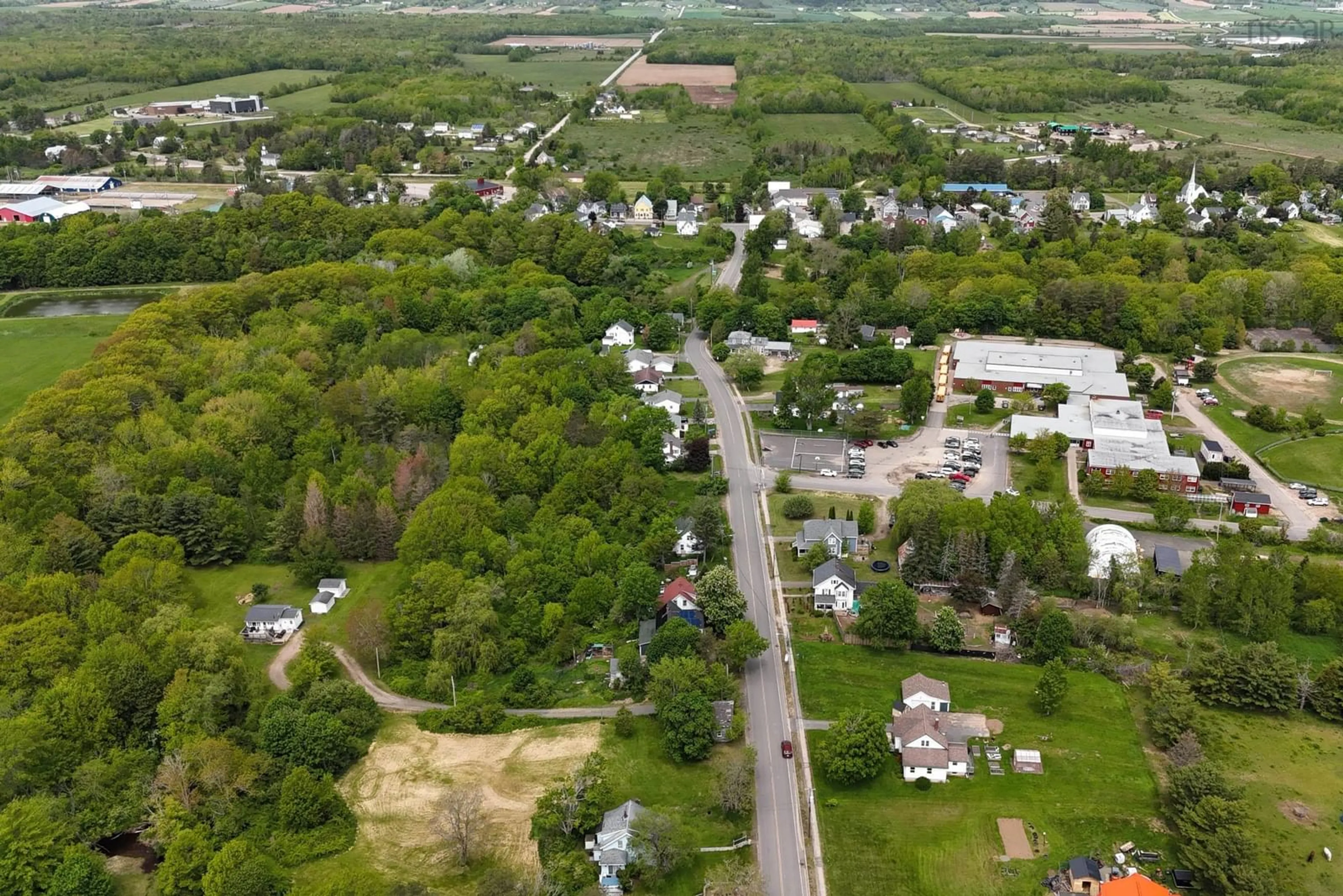 A pic from outside/outdoor area/front of a property/back of a property/a pic from drone, street for 67 Lawrencetown Lane, Lawrencetown Nova Scotia B0S 1M0