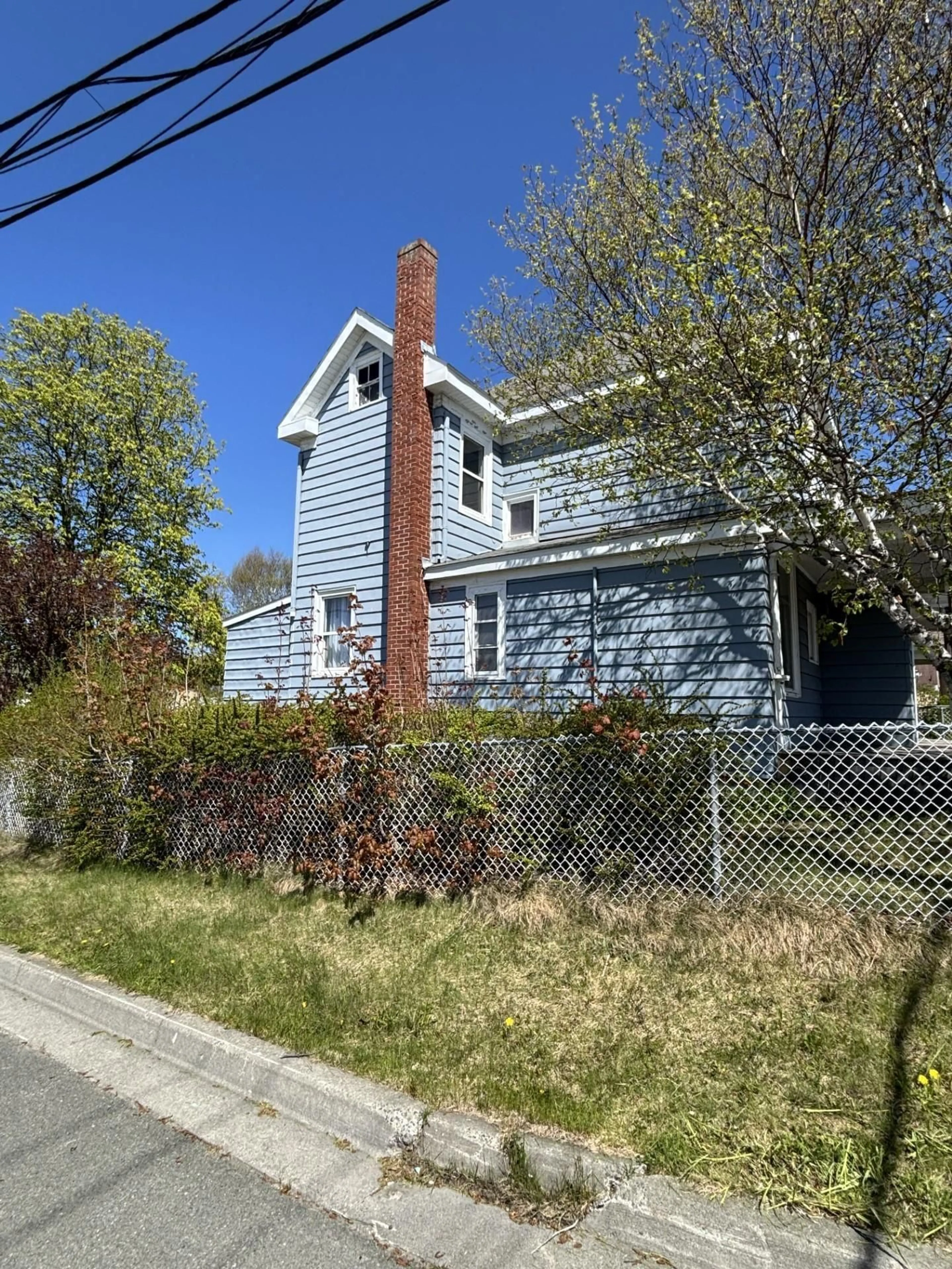A pic from outside/outdoor area/front of a property/back of a property/a pic from drone, street for 21 Regent St, North Sydney Nova Scotia B2A 2E3