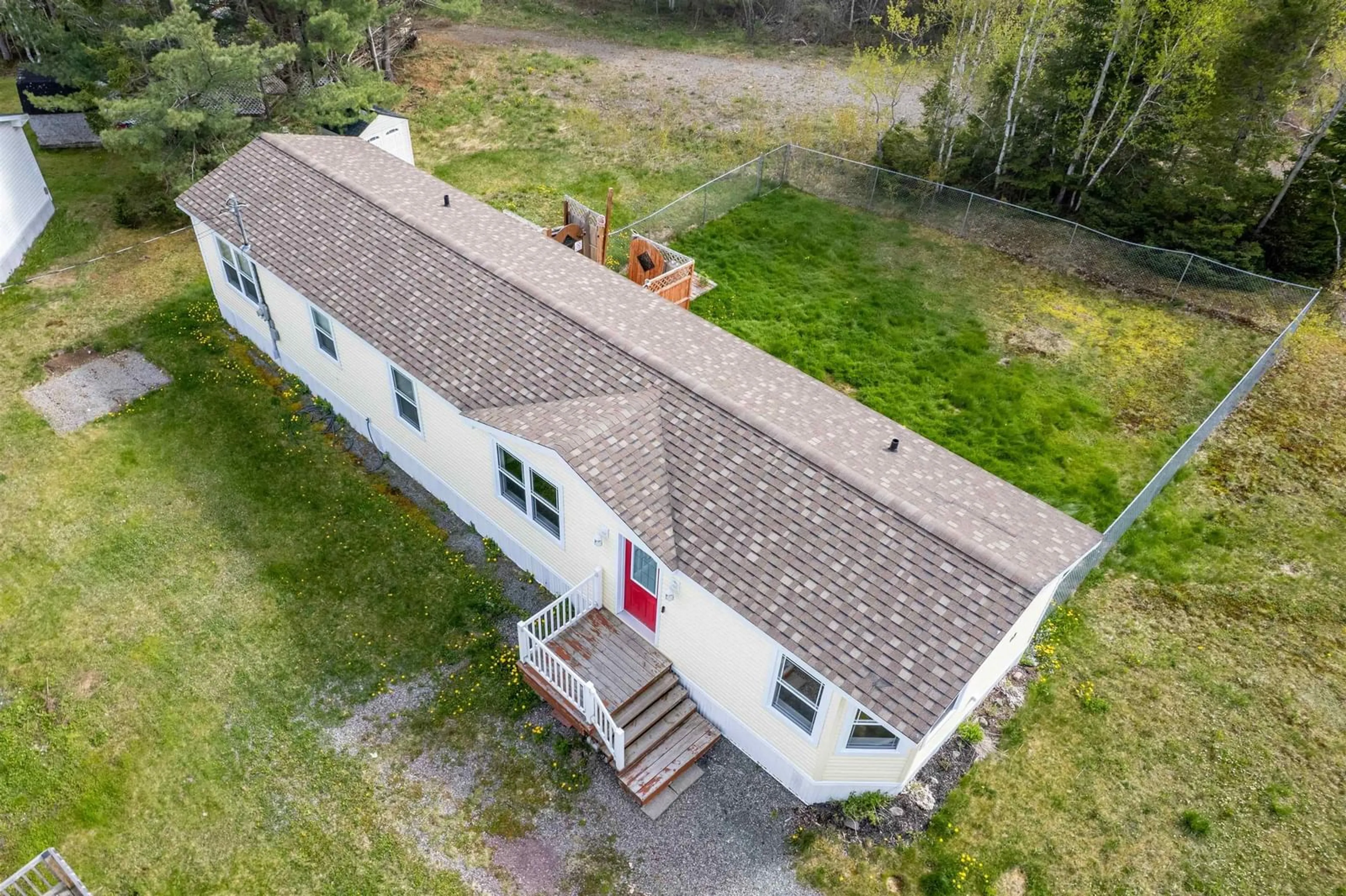 A pic from outside/outdoor area/front of a property/back of a property/a pic from drone, building for 12 Whispering Pines Rd, Mira Road Nova Scotia B1M 1C6