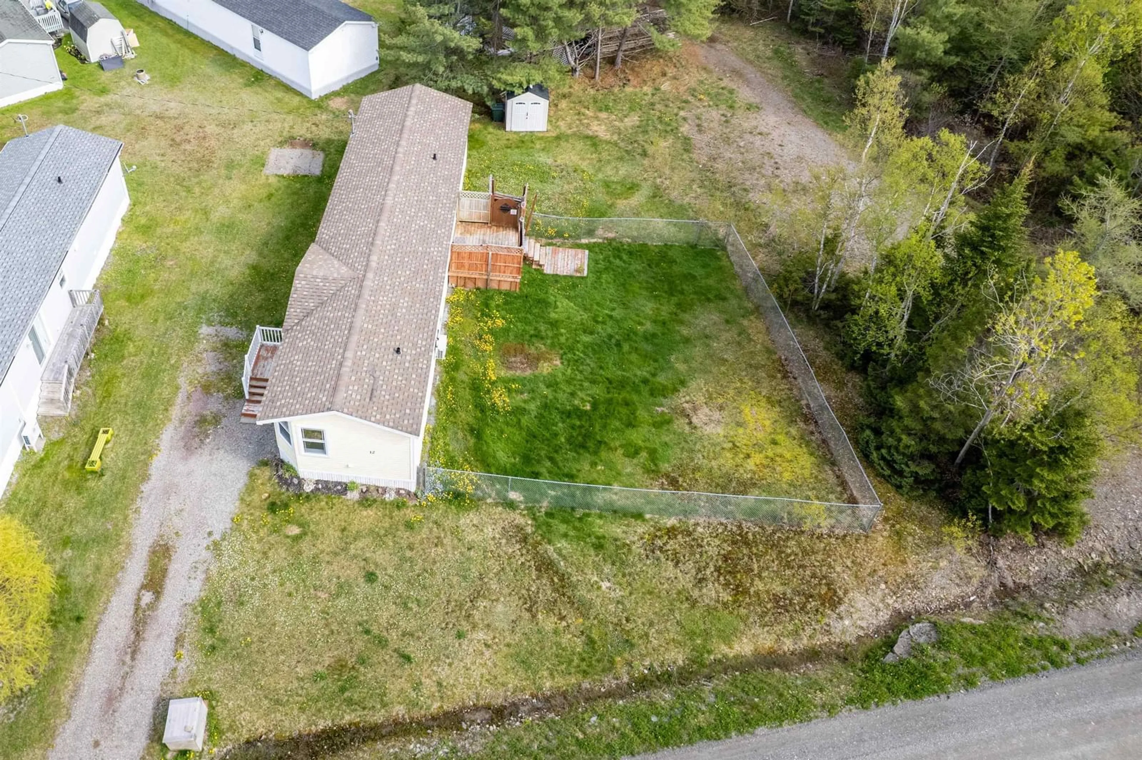 A pic from outside/outdoor area/front of a property/back of a property/a pic from drone, unknown for 12 Whispering Pines Rd, Mira Road Nova Scotia B1M 1C6