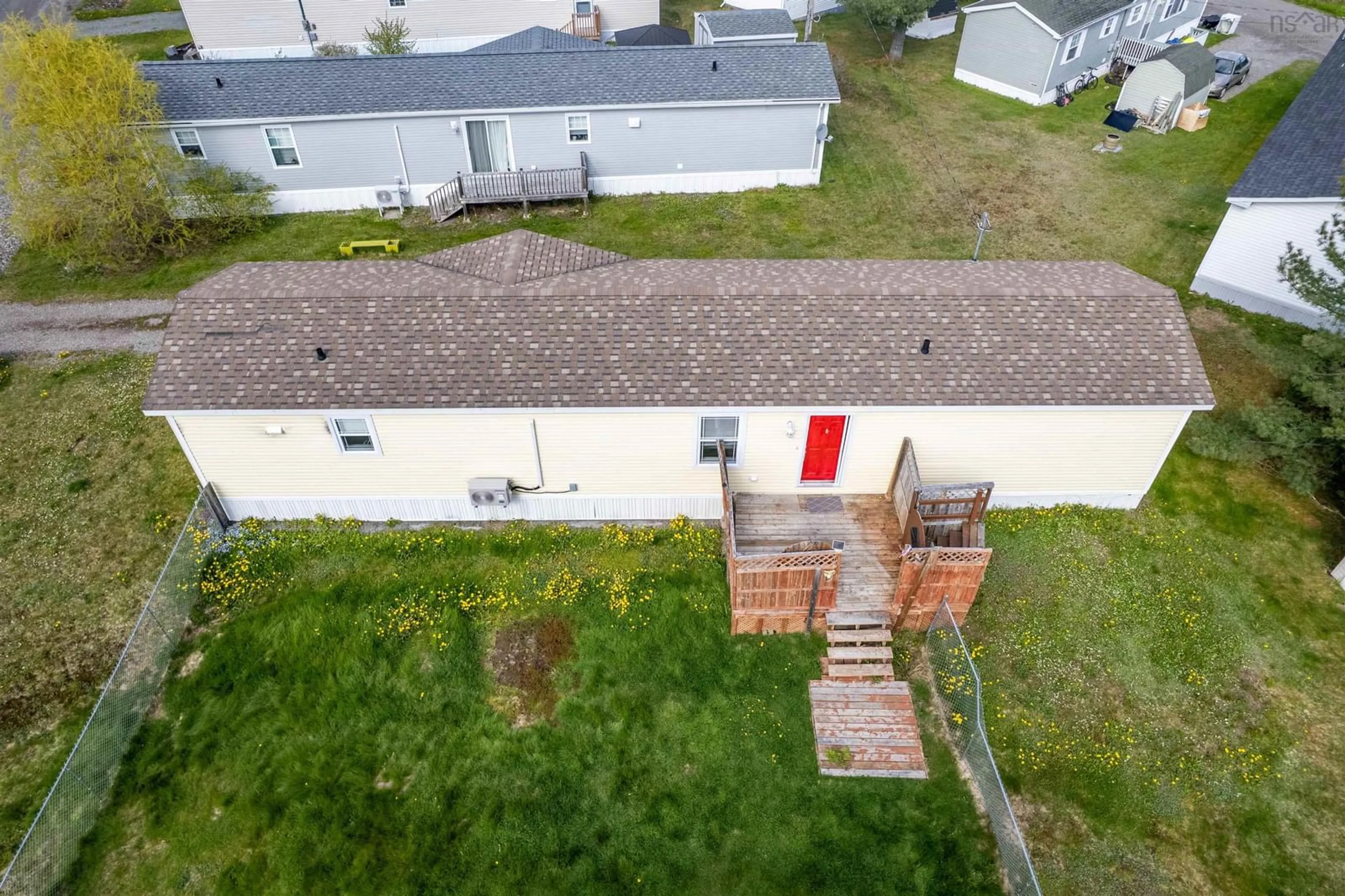 A pic from outside/outdoor area/front of a property/back of a property/a pic from drone, unknown for 12 Whispering Pines Rd, Mira Road Nova Scotia B1M 1C6