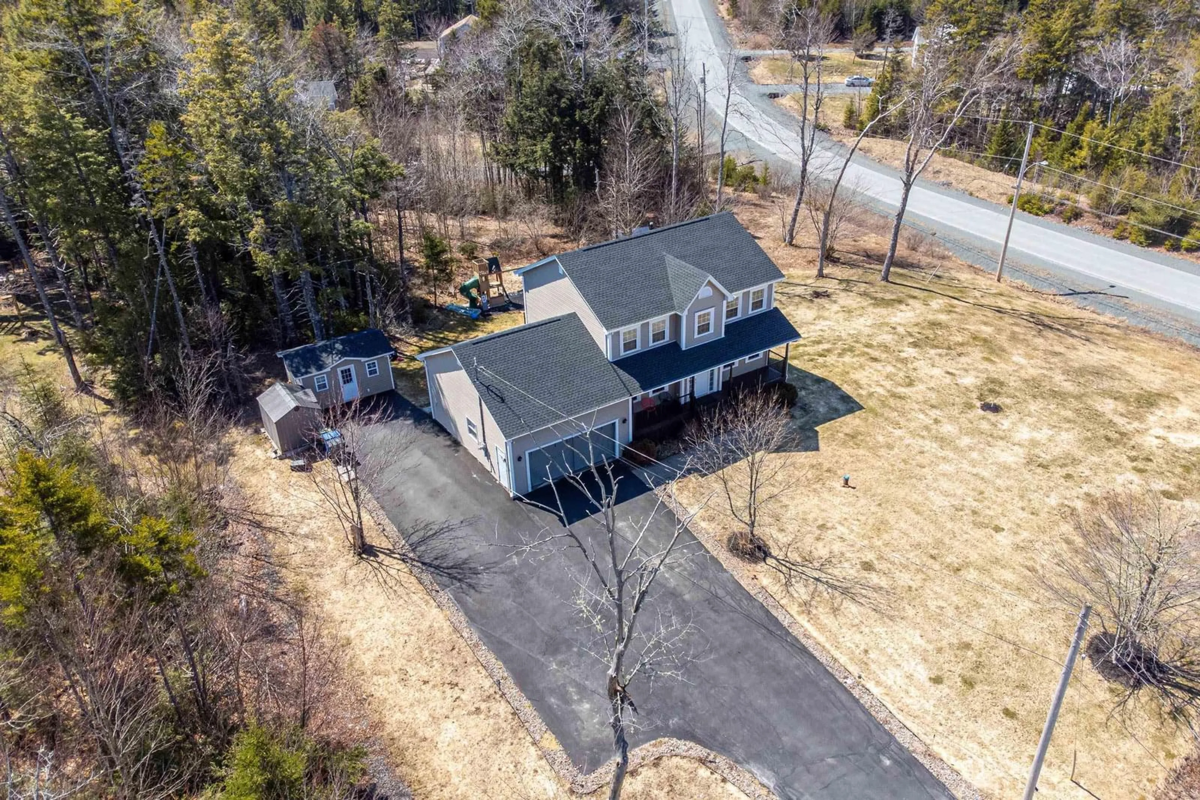 A pic from outside/outdoor area/front of a property/back of a property/a pic from drone, street for 9 Wessex Hill, Beaver Bank Nova Scotia B4E 3P4