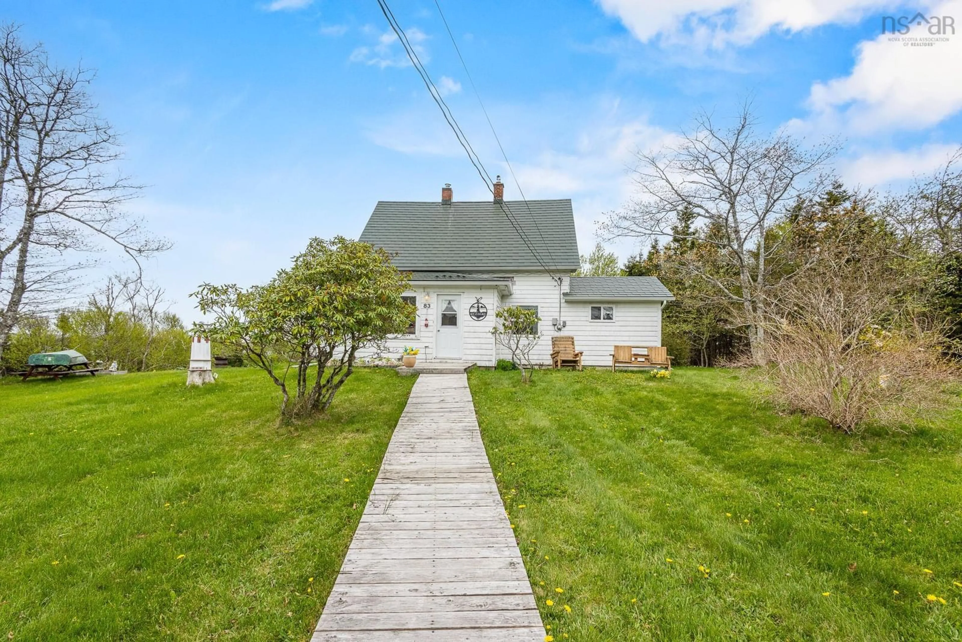 A pic from outside/outdoor area/front of a property/back of a property/a pic from drone, water/lake/river/ocean view for 83 Baker Rd, Myers Point Nova Scotia B0J 1P0