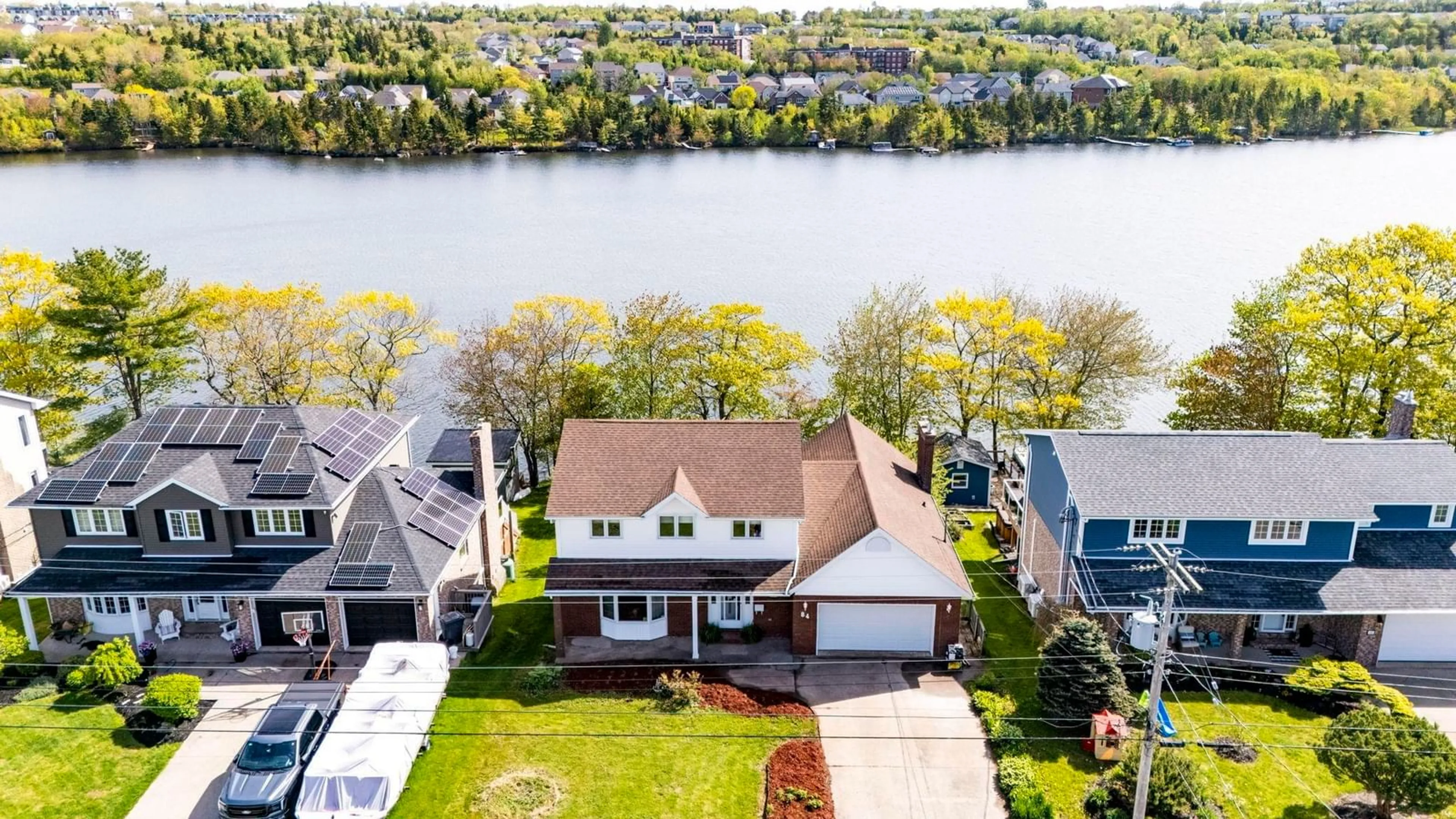 A pic from outside/outdoor area/front of a property/back of a property/a pic from drone, water/lake/river/ocean view for 84 Diana Grace Ave, Dartmouth Nova Scotia B2W 6A2