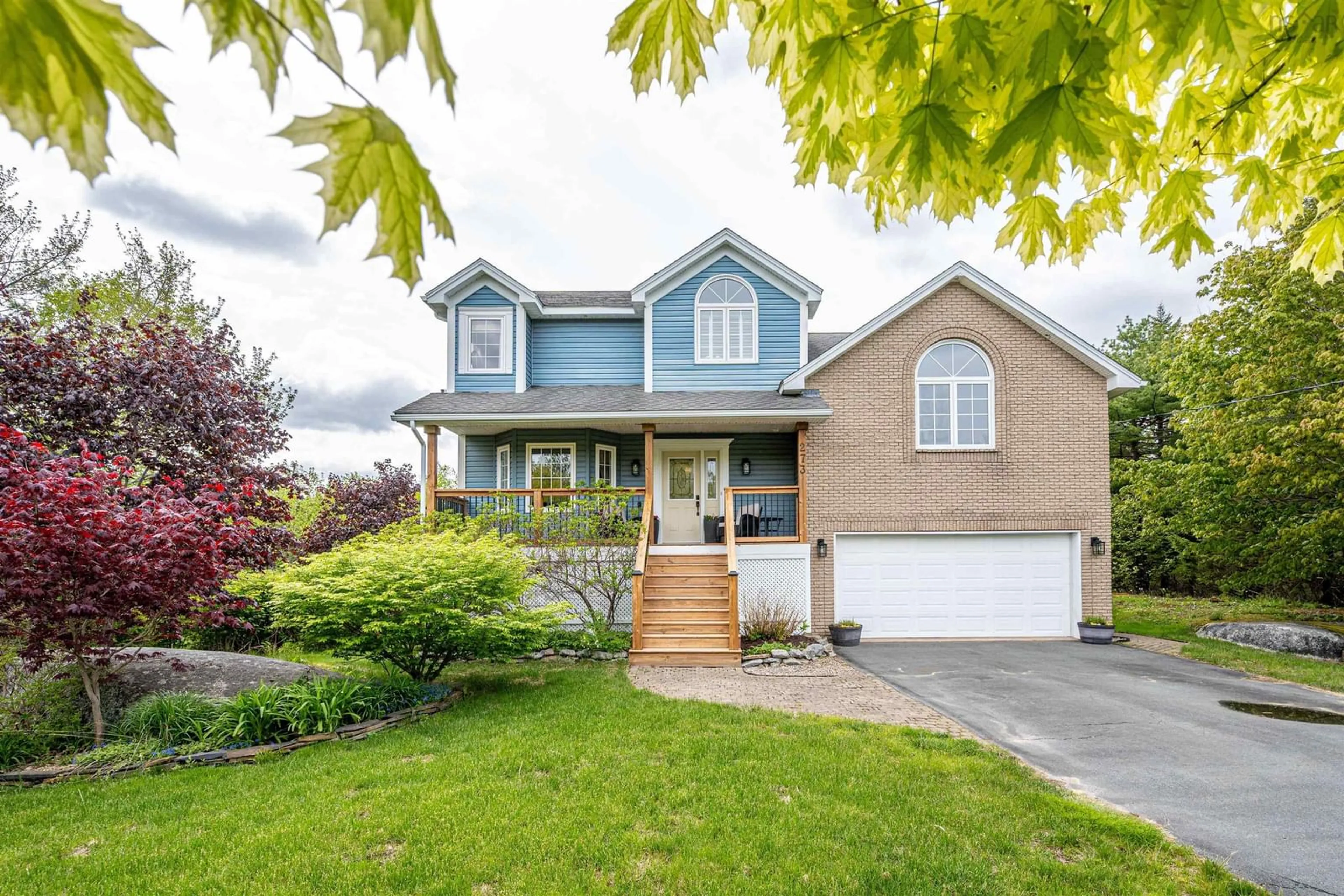 Home with vinyl exterior material, street for 273 Kingswood Dr, Hammonds Plains Nova Scotia B4B 1L8
