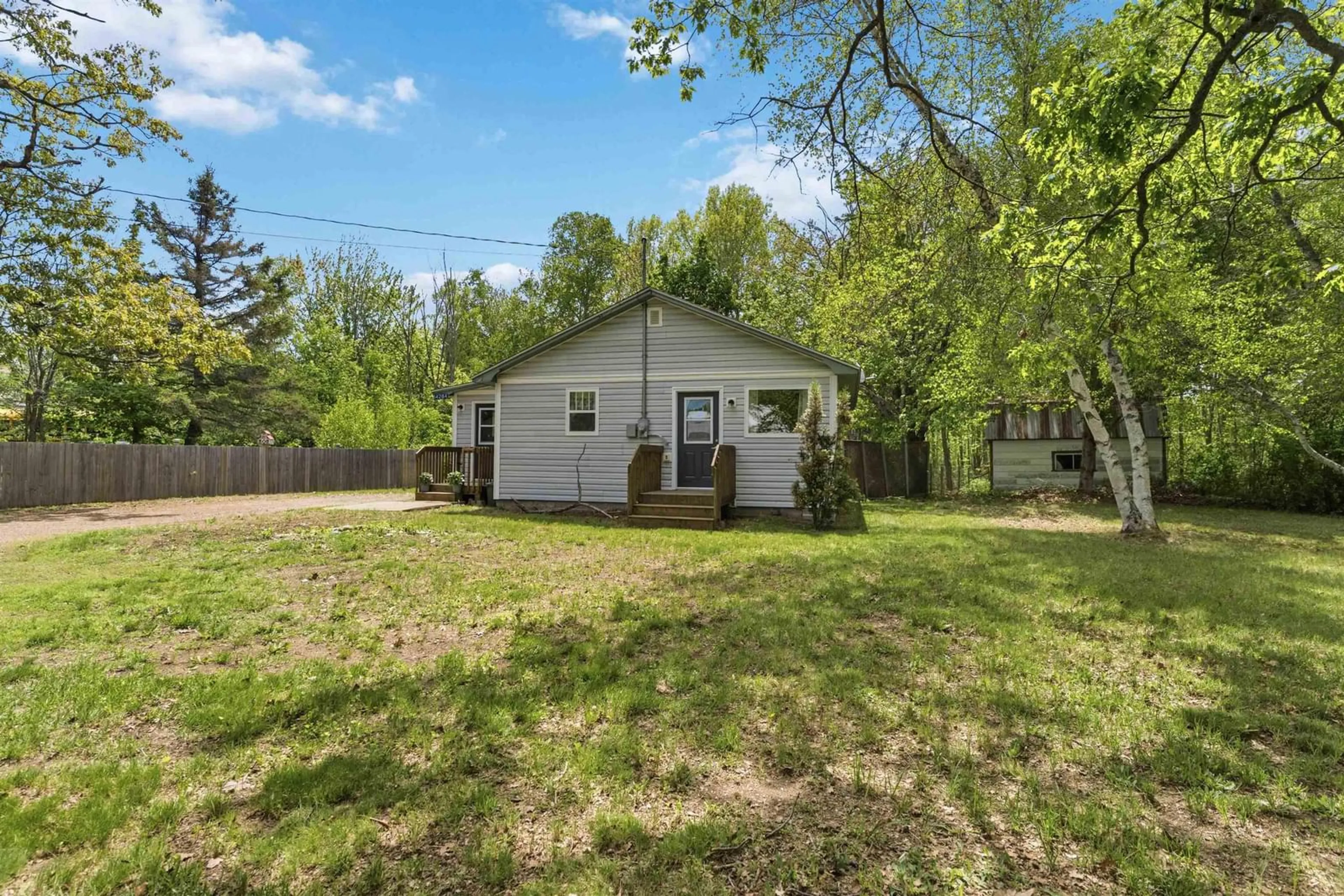 A pic from outside/outdoor area/front of a property/back of a property/a pic from drone, unknown for 14284 Highway 1, Wilmot Nova Scotia B0S 1P0