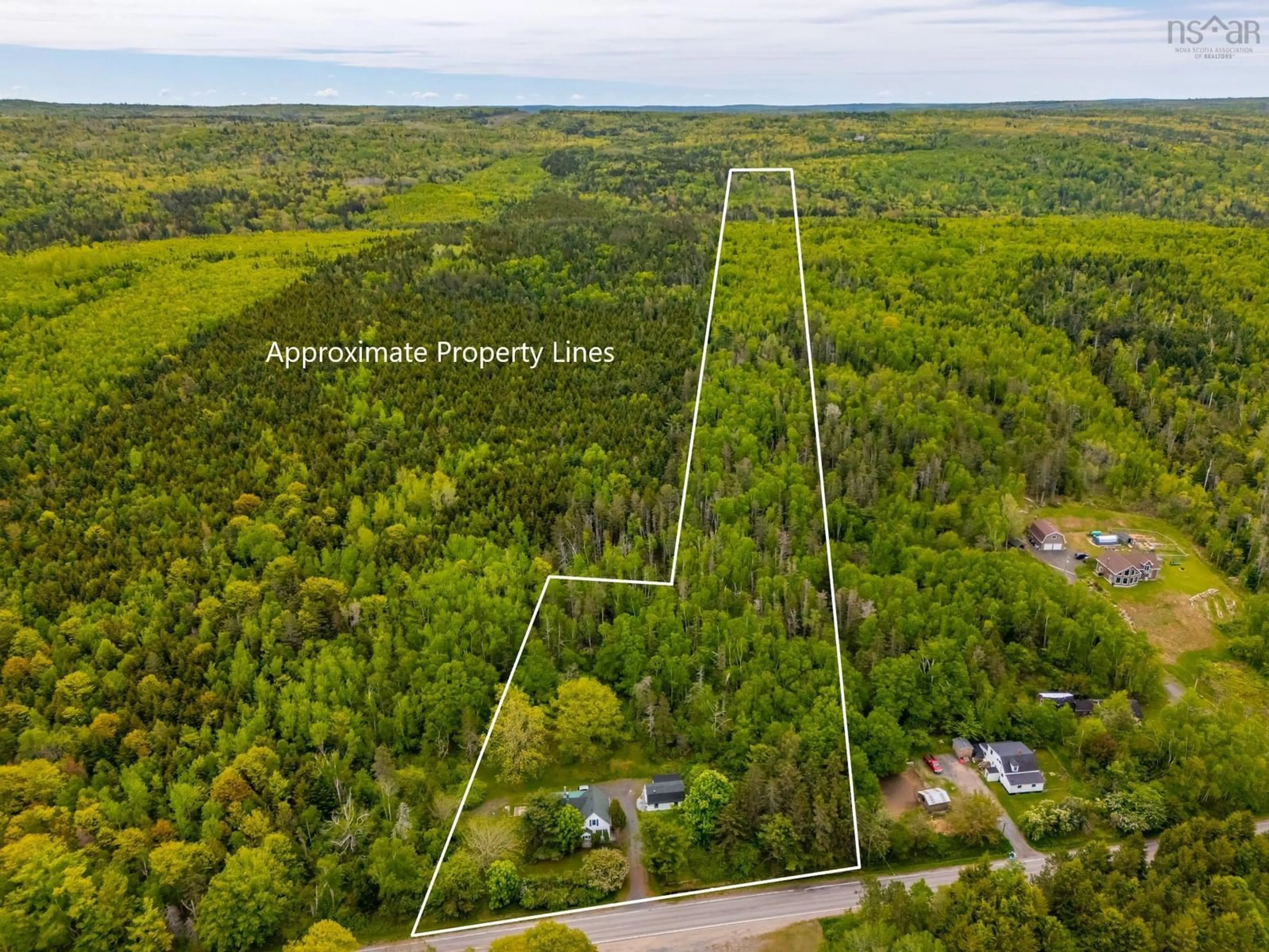 A pic from outside/outdoor area/front of a property/back of a property/a pic from drone, forest/trees view for 2526 Highway 1, Upper Clements Nova Scotia B0S 1A0