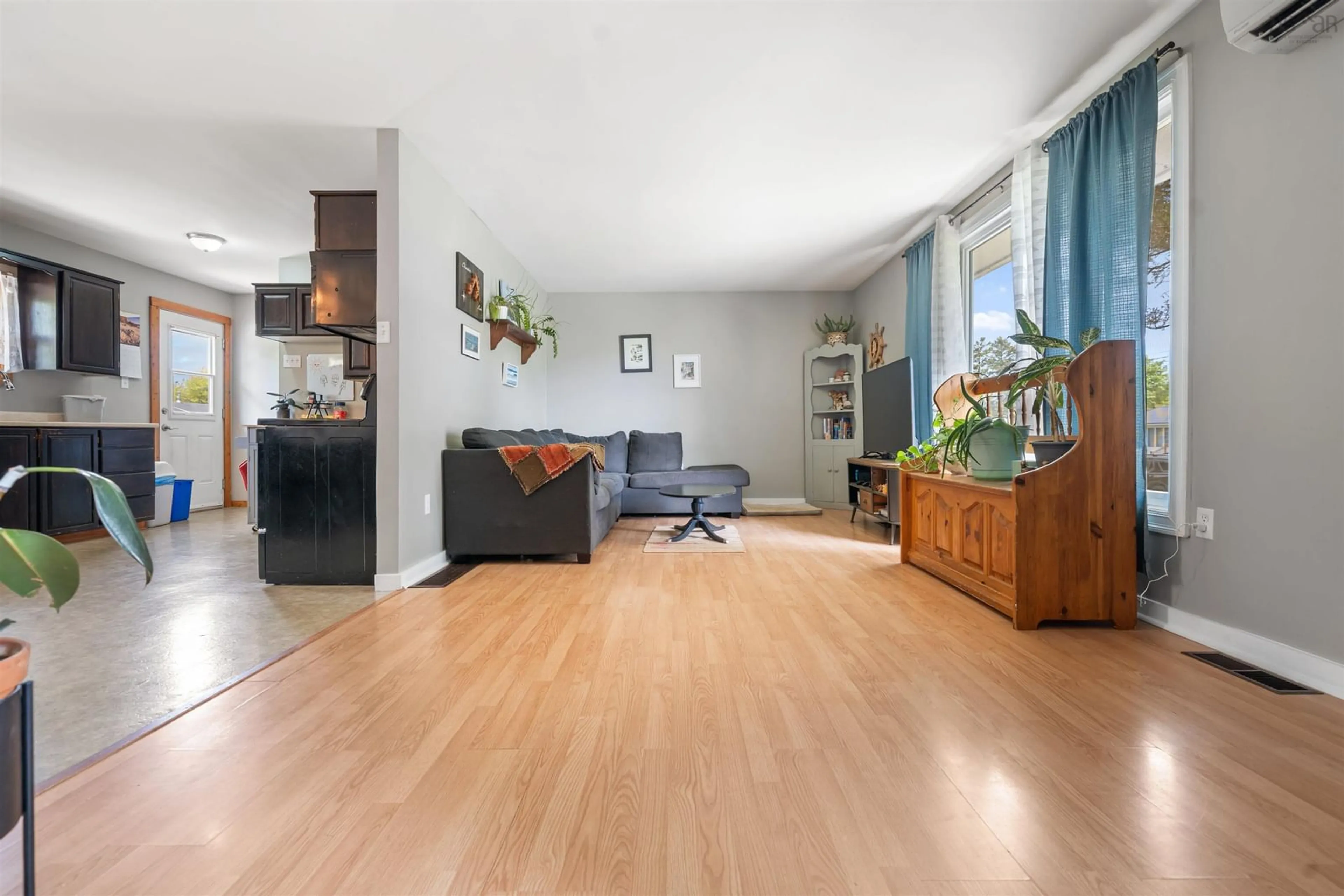Living room with furniture, wood/laminate floor for 155 Cedar Street St, Pictou Nova Scotia B0K 1H0