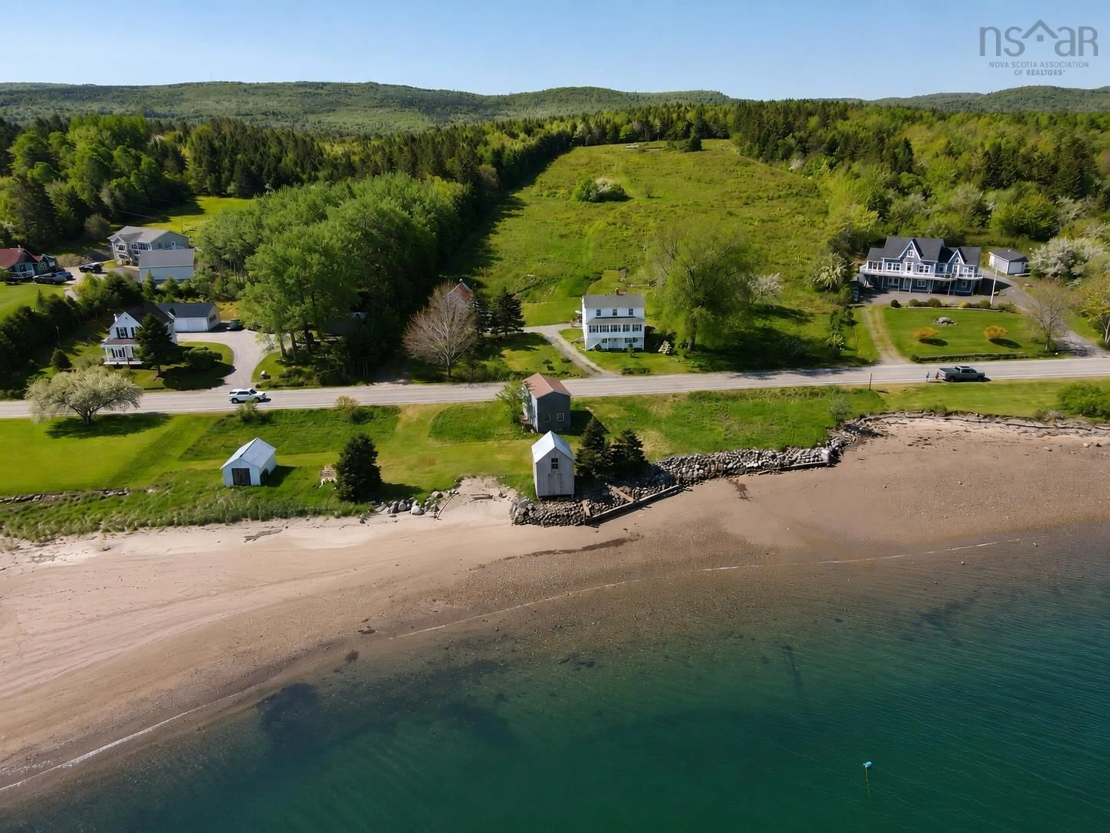 A pic from outside/outdoor area/front of a property/back of a property/a pic from drone, water/lake/river/ocean view for 9399 Ns-16, Cooks Cove Nova Scotia B0H 1N0