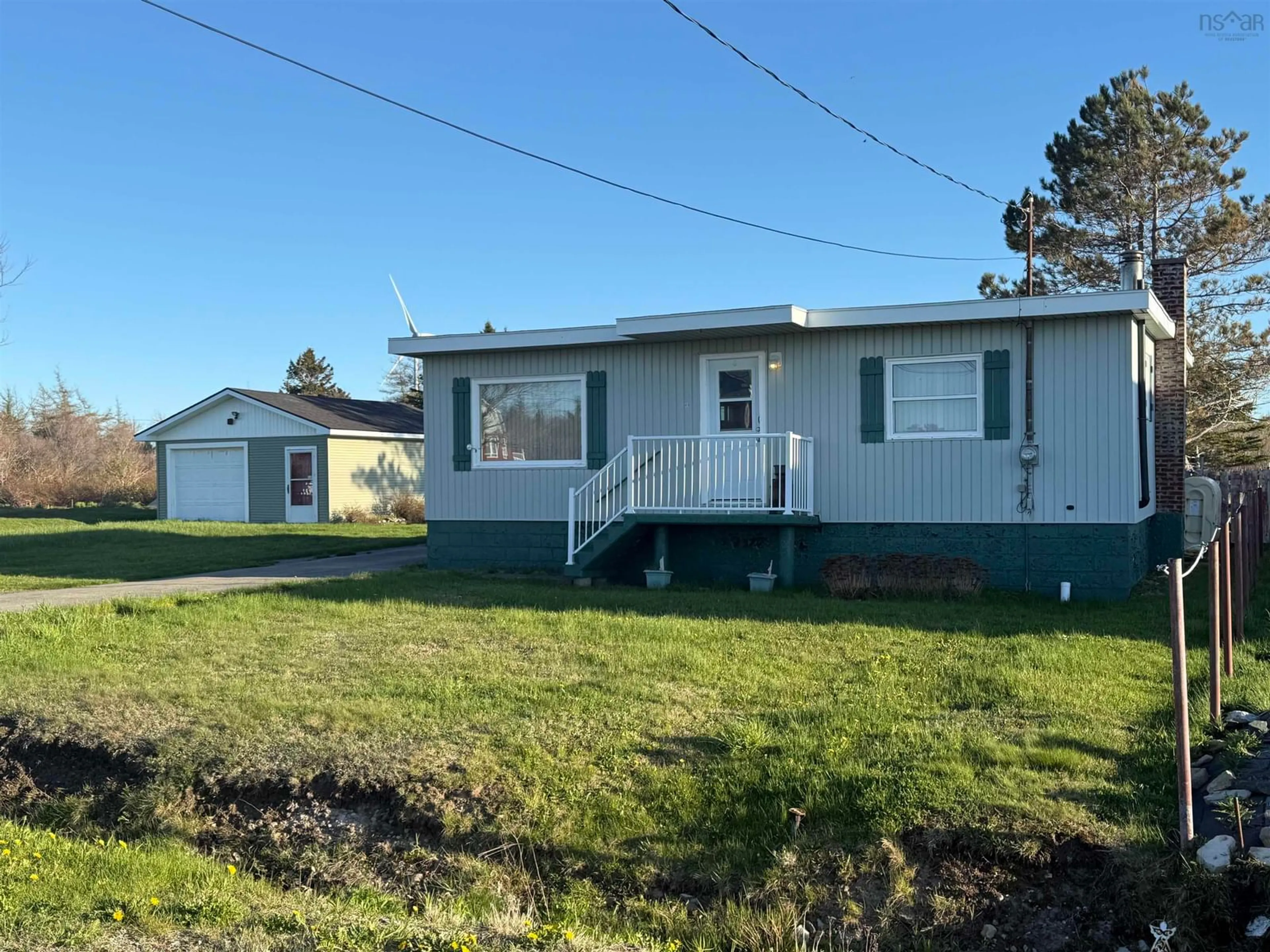 Home with vinyl exterior material, street for 40 Daley Rd, New Victoria Nova Scotia B1H 4Z4