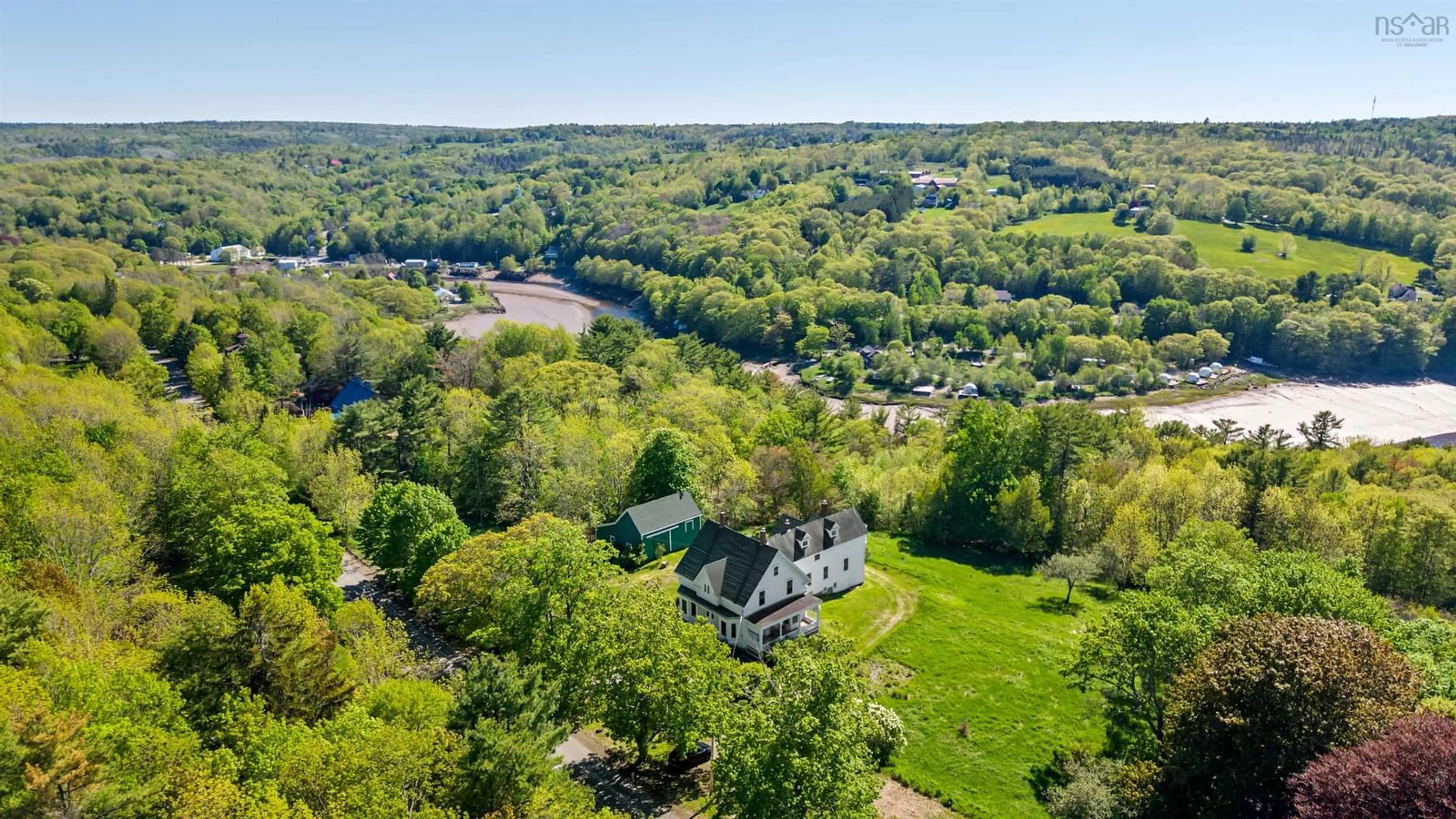 A pic from outside/outdoor area/front of a property/back of a property/a pic from drone, water/lake/river/ocean view for 81 Chute Rd, Bear River Nova Scotia B0S 1B0
