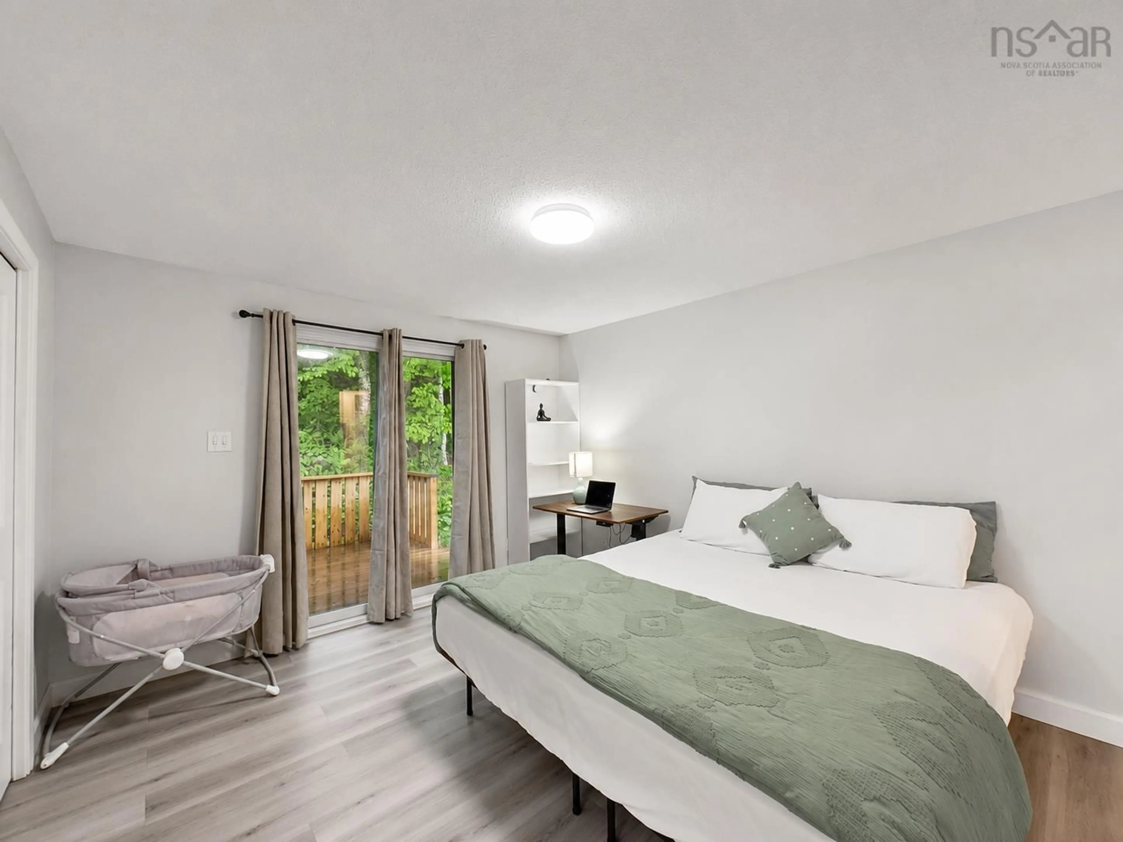 Bedroom with bed, wood/laminate floor for 102 River Lane, Bedford Nova Scotia B4A 4J5