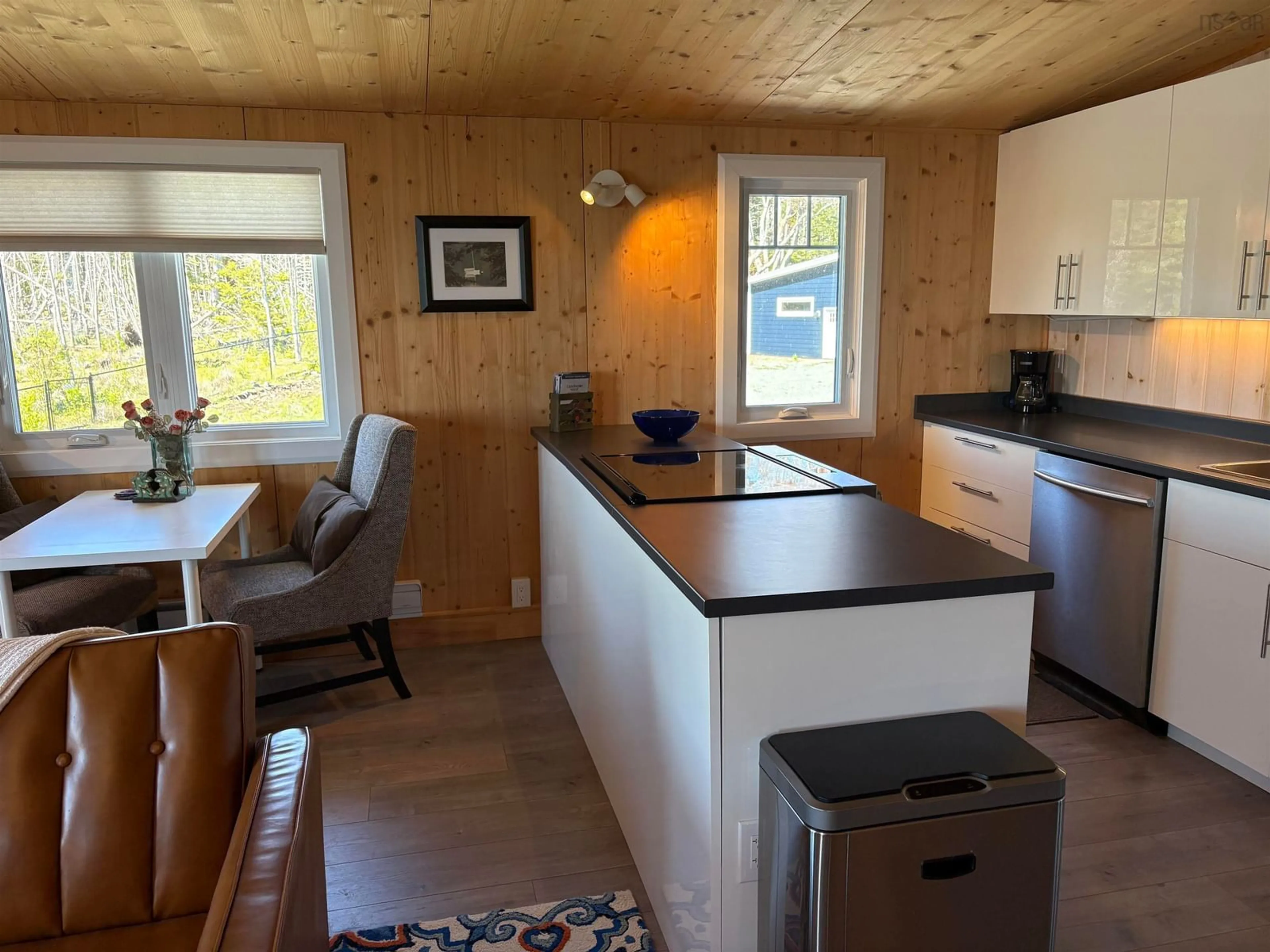 Open concept kitchen, wood/laminate floor for 122 Peter Sosna Dr, Macnabs Cove Nova Scotia B0E 3B0
