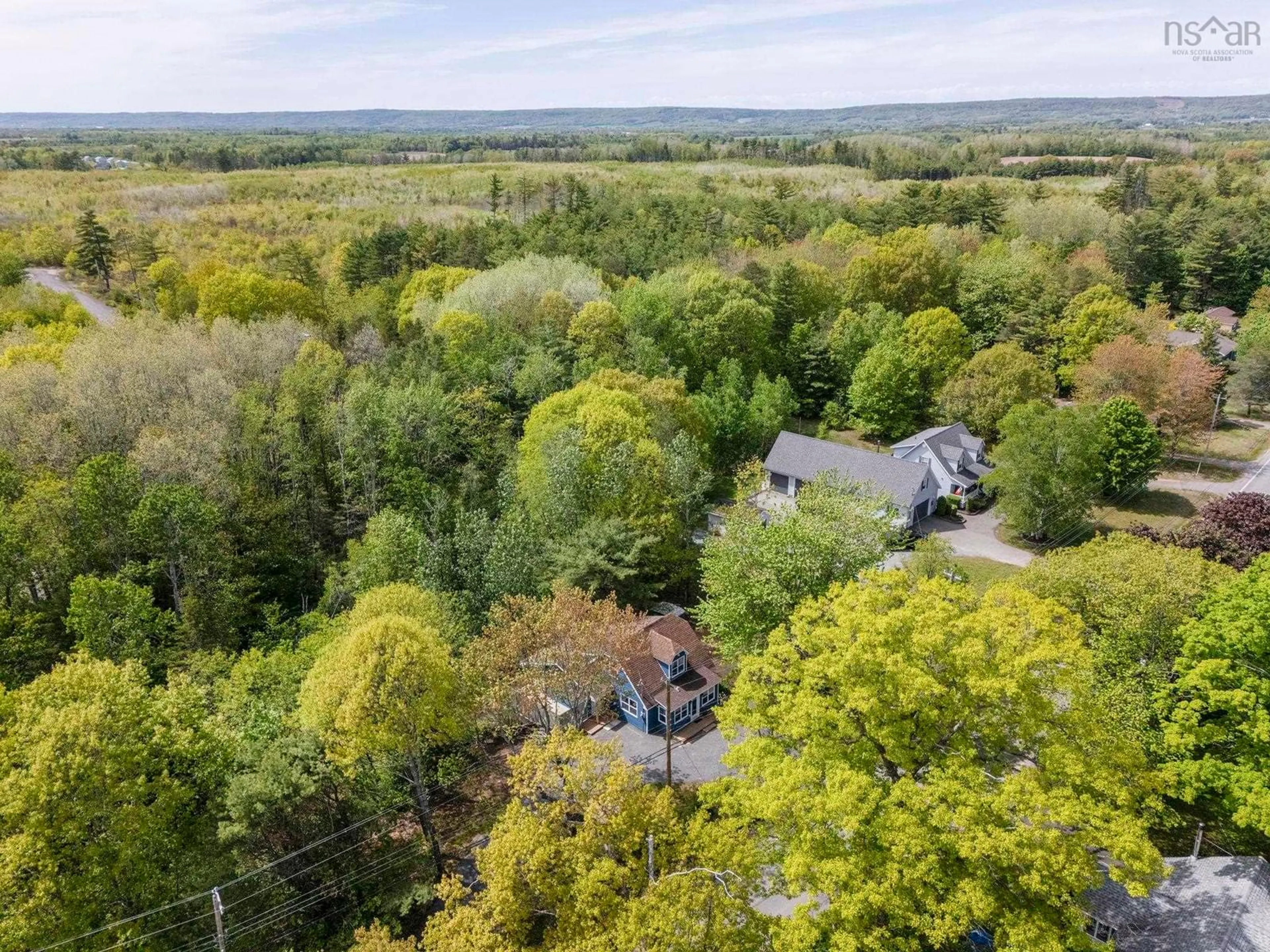 A pic from outside/outdoor area/front of a property/back of a property/a pic from drone, forest/trees view for 887 Cambridge Rd, Cambridge Nova Scotia B0P 1G0
