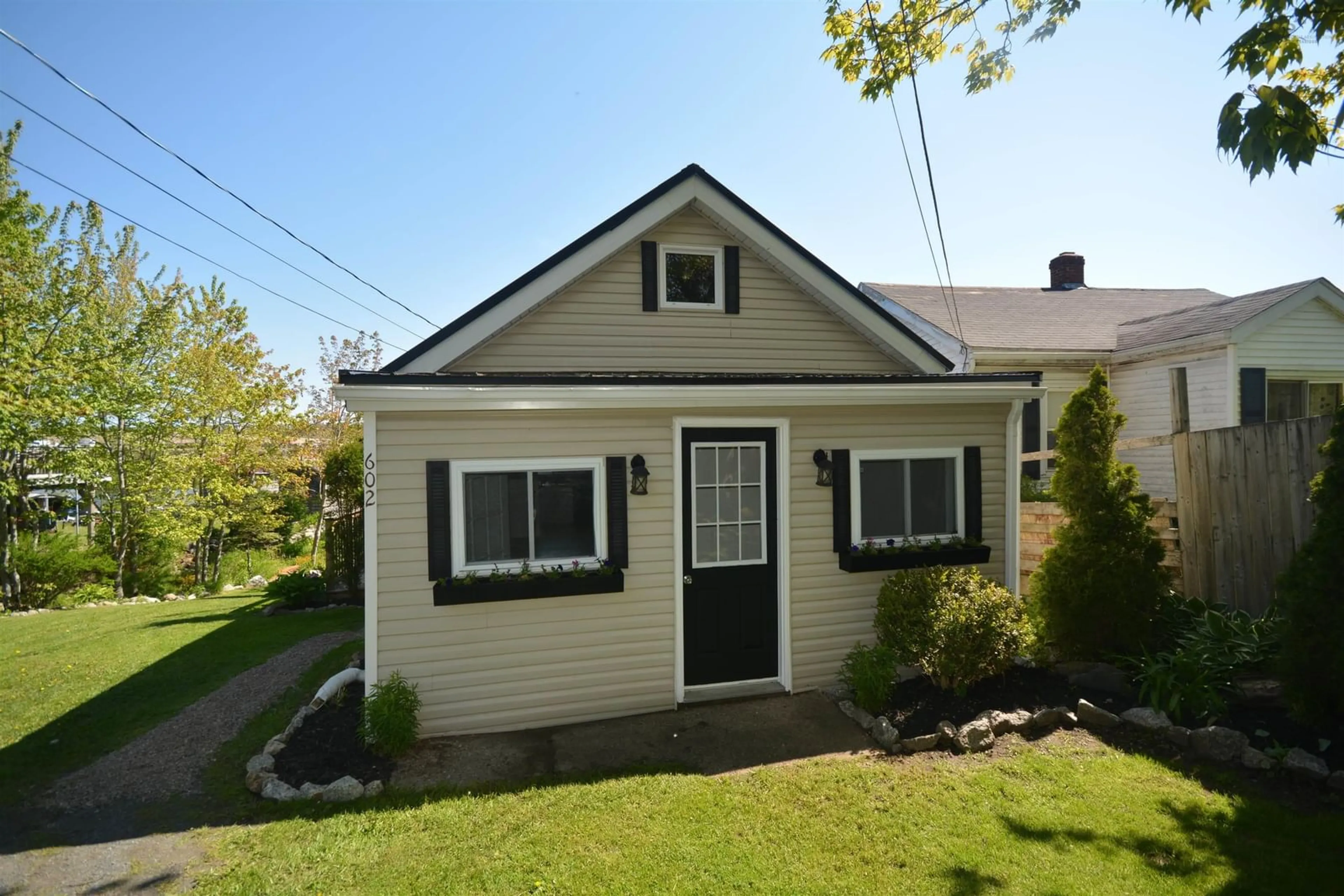 Home with vinyl exterior material, street for 602 Herring Cove Rd, Halifax Nova Scotia B3R 1X6