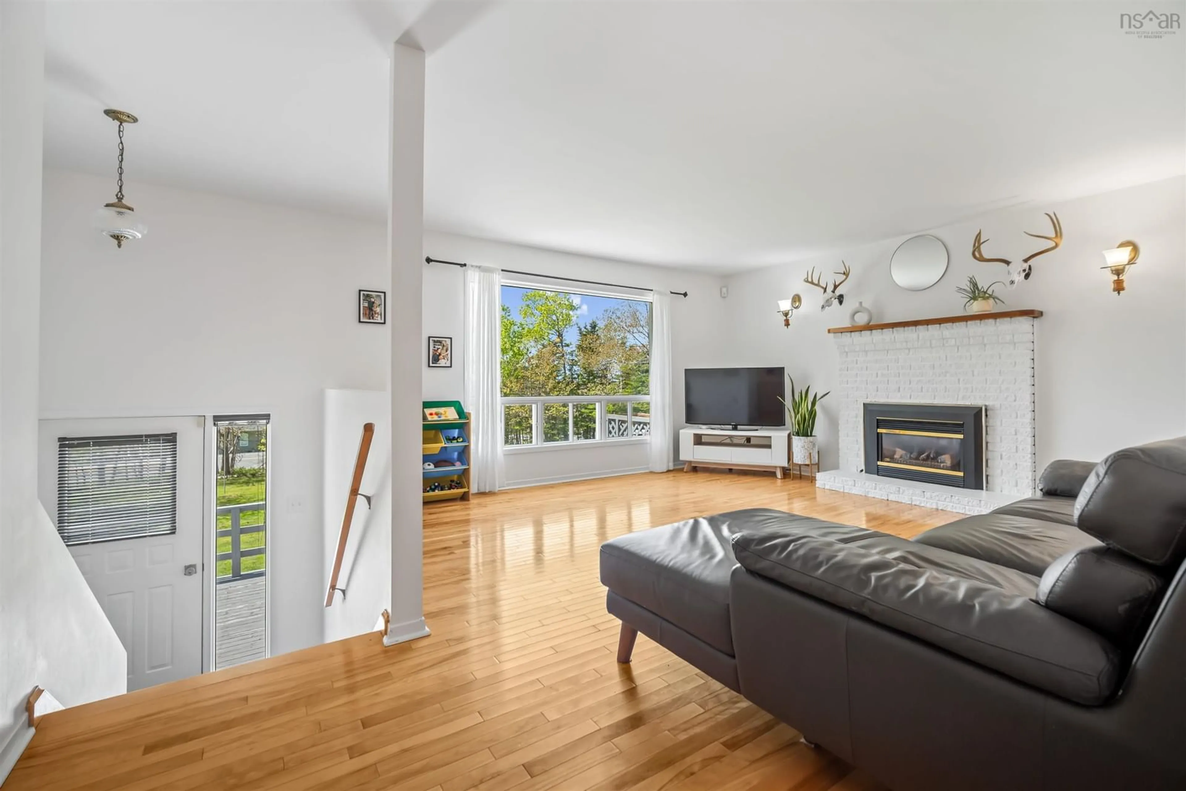 Living room with furniture, unknown for 2834 Prospect Rd, Whites Lake Nova Scotia B3T 2A7