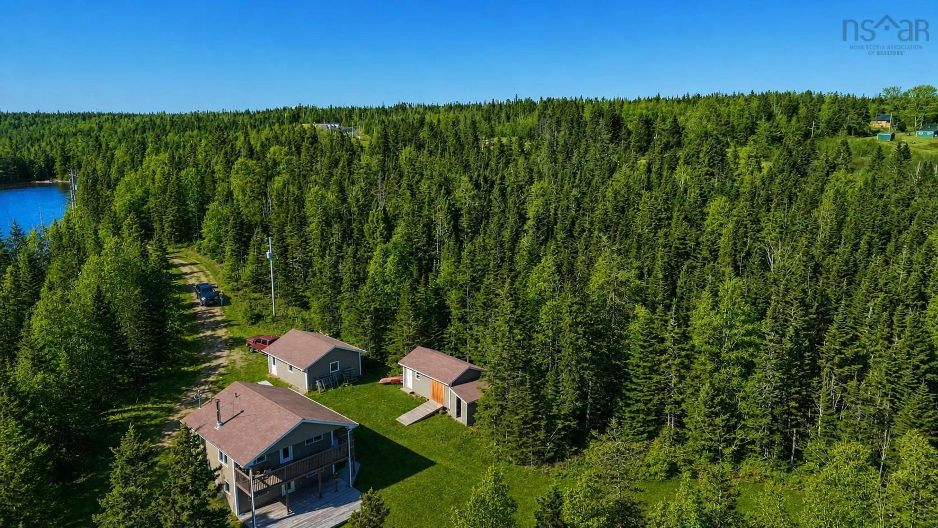 A pic from outside/outdoor area/front of a property/back of a property/a pic from drone, forest/trees view for 11 Kelly Lane, Walkerville Nova Scotia B0E 1J0