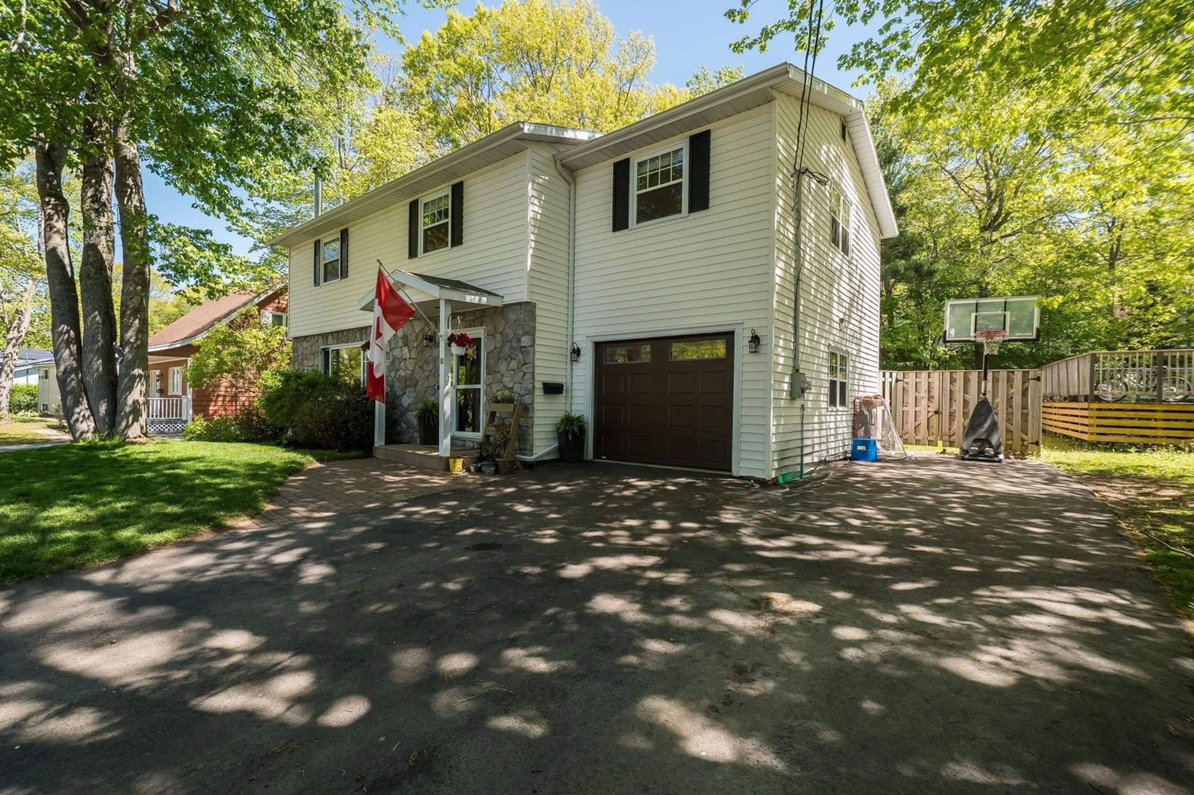 Home with vinyl exterior material, street for 82 Hirtle Dr, Bridgewater Nova Scotia B4V 3N6