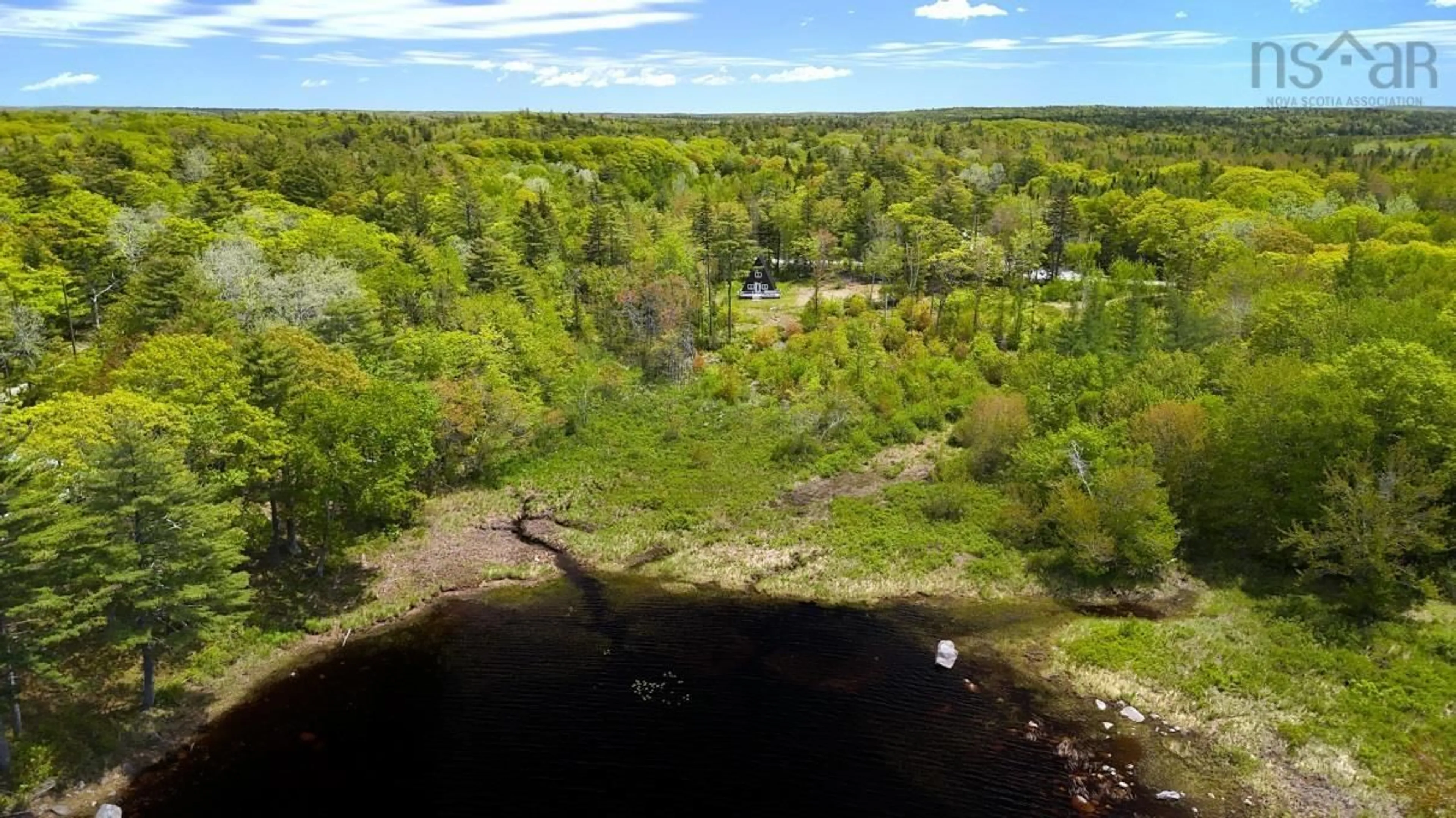 A pic from outside/outdoor area/front of a property/back of a property/a pic from drone, water/lake/river/ocean view for 8019 Highway 308, East Quinan Nova Scotia B0W 3M0