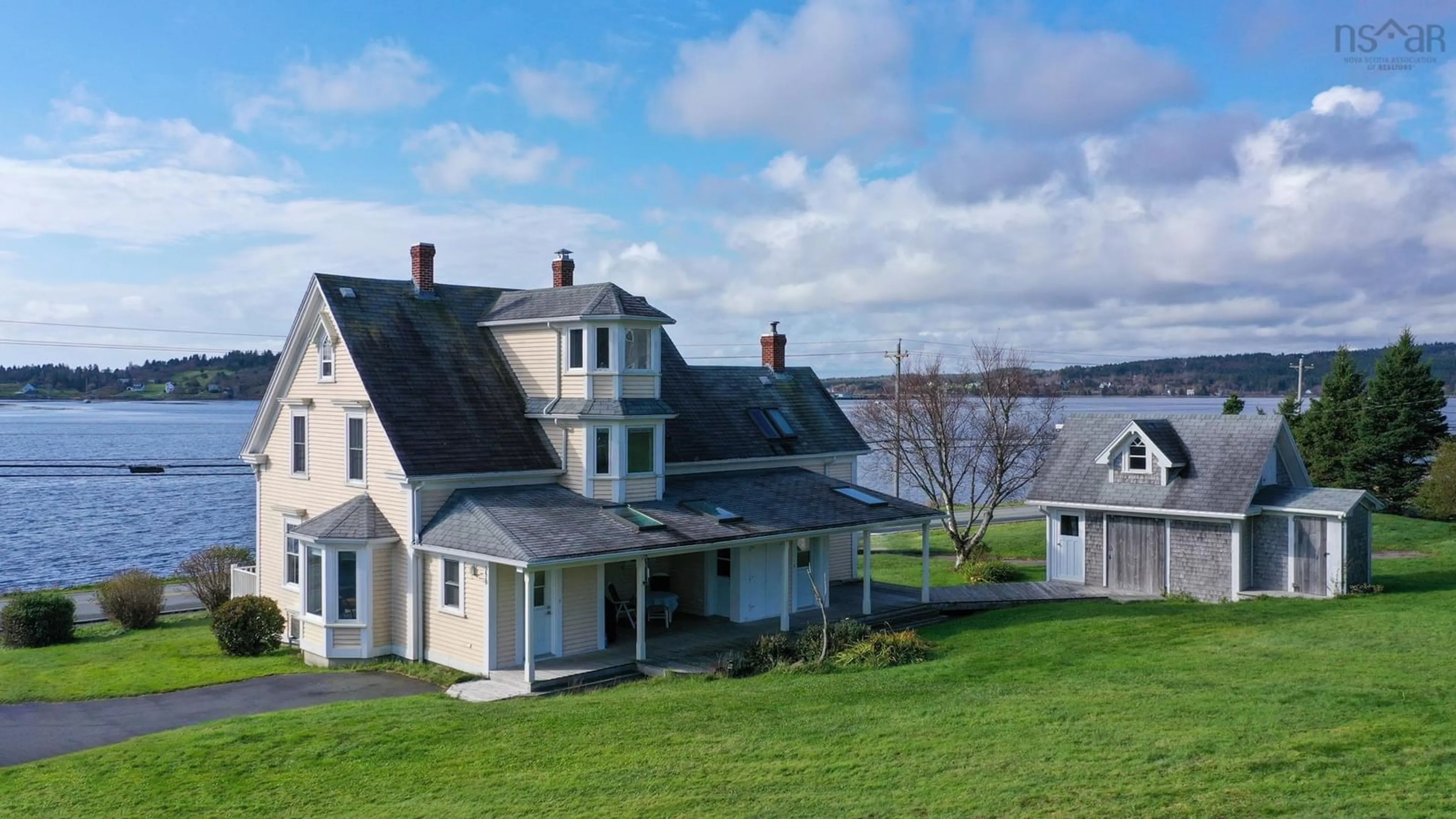 A pic from outside/outdoor area/front of a property/back of a property/a pic from drone, unknown for 3964 Highway 332, Riverport Nova Scotia B0J 2X0