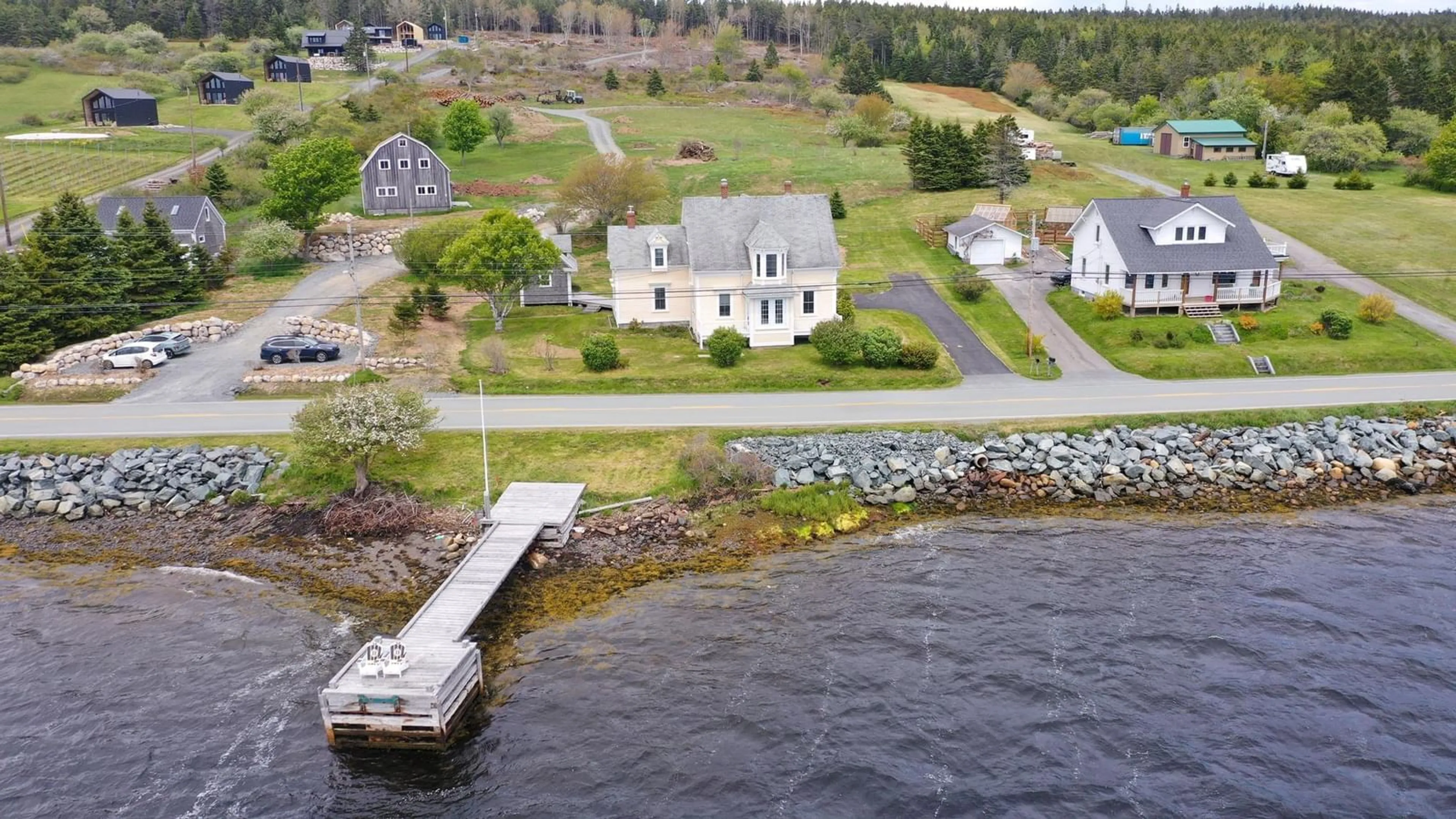 A pic from outside/outdoor area/front of a property/back of a property/a pic from drone, water/lake/river/ocean view for 3964 Highway 332, Riverport Nova Scotia B0J 2X0