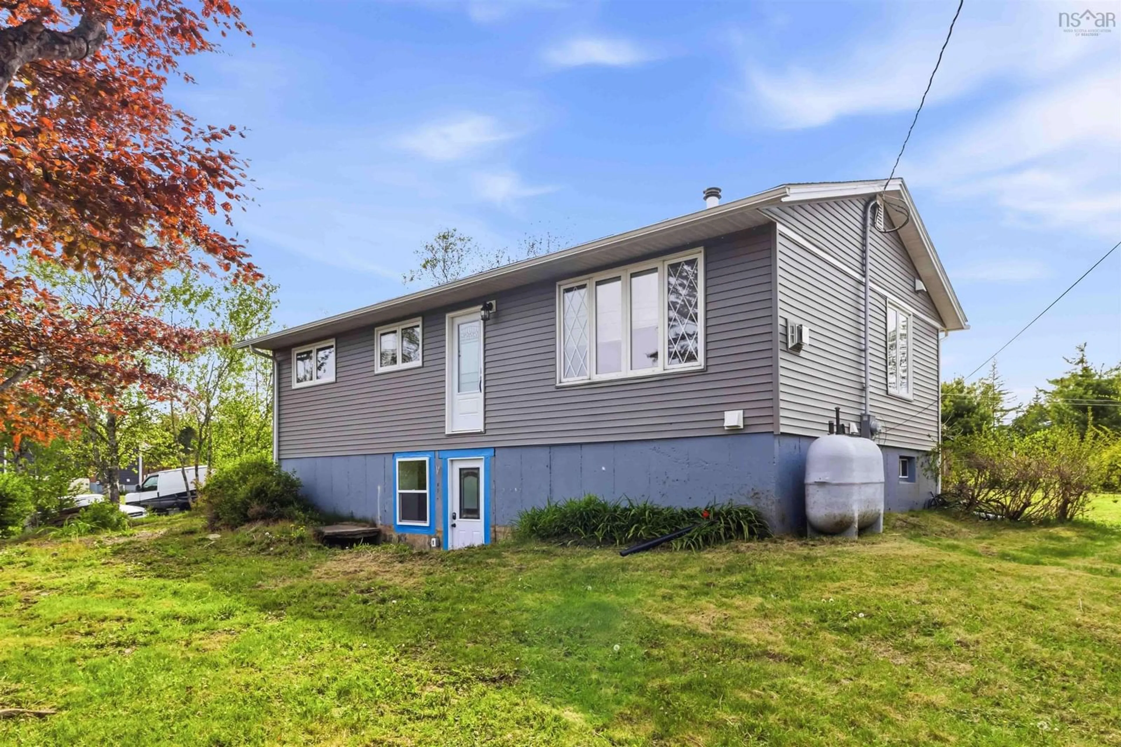 Home with vinyl exterior material, street for 428 Dyke Rd, Cow Bay Nova Scotia B3G 1K6