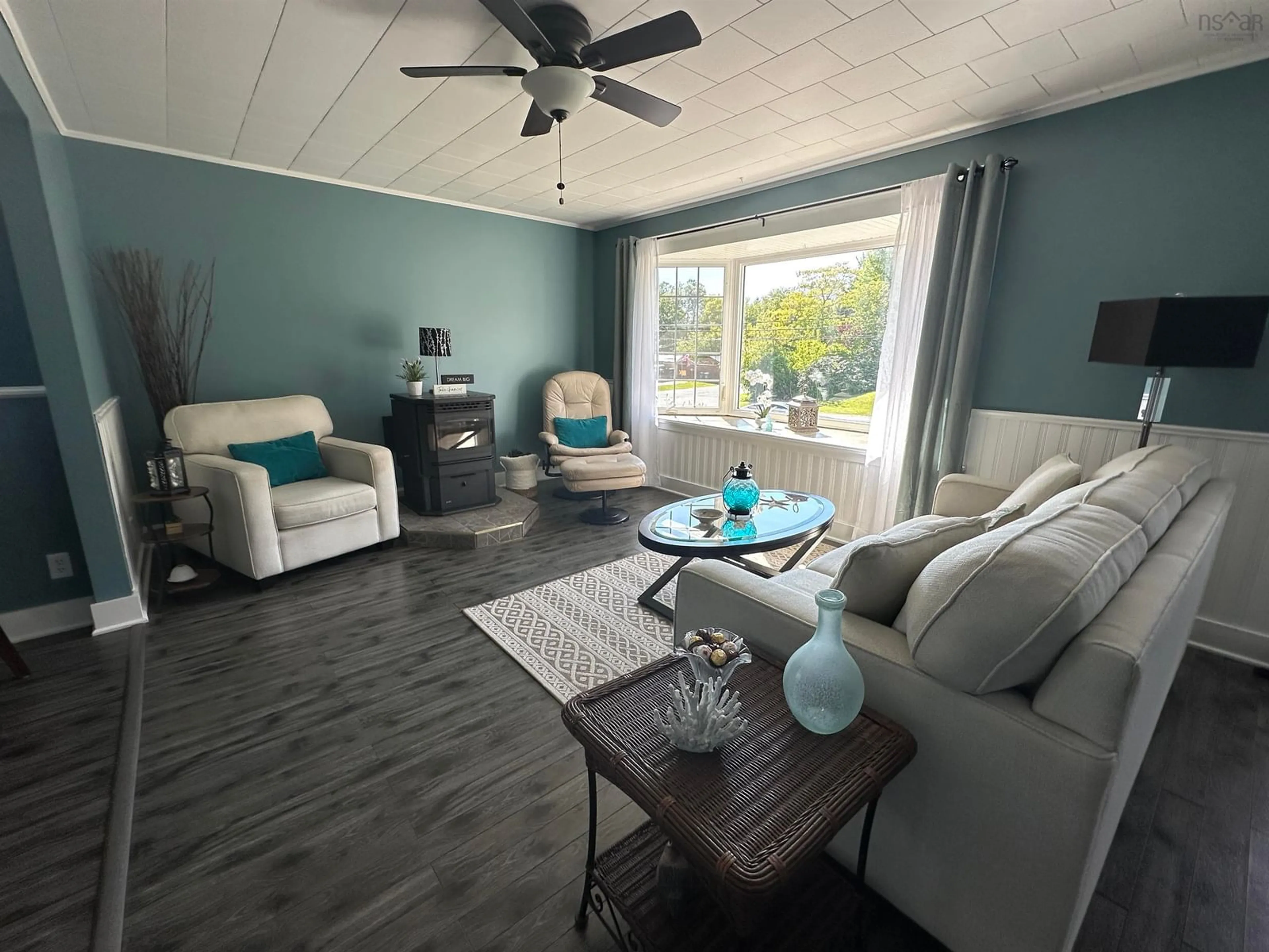 Living room with furniture, wood/laminate floor for 39 Barss St, Liverpool Nova Scotia B0T 1K0