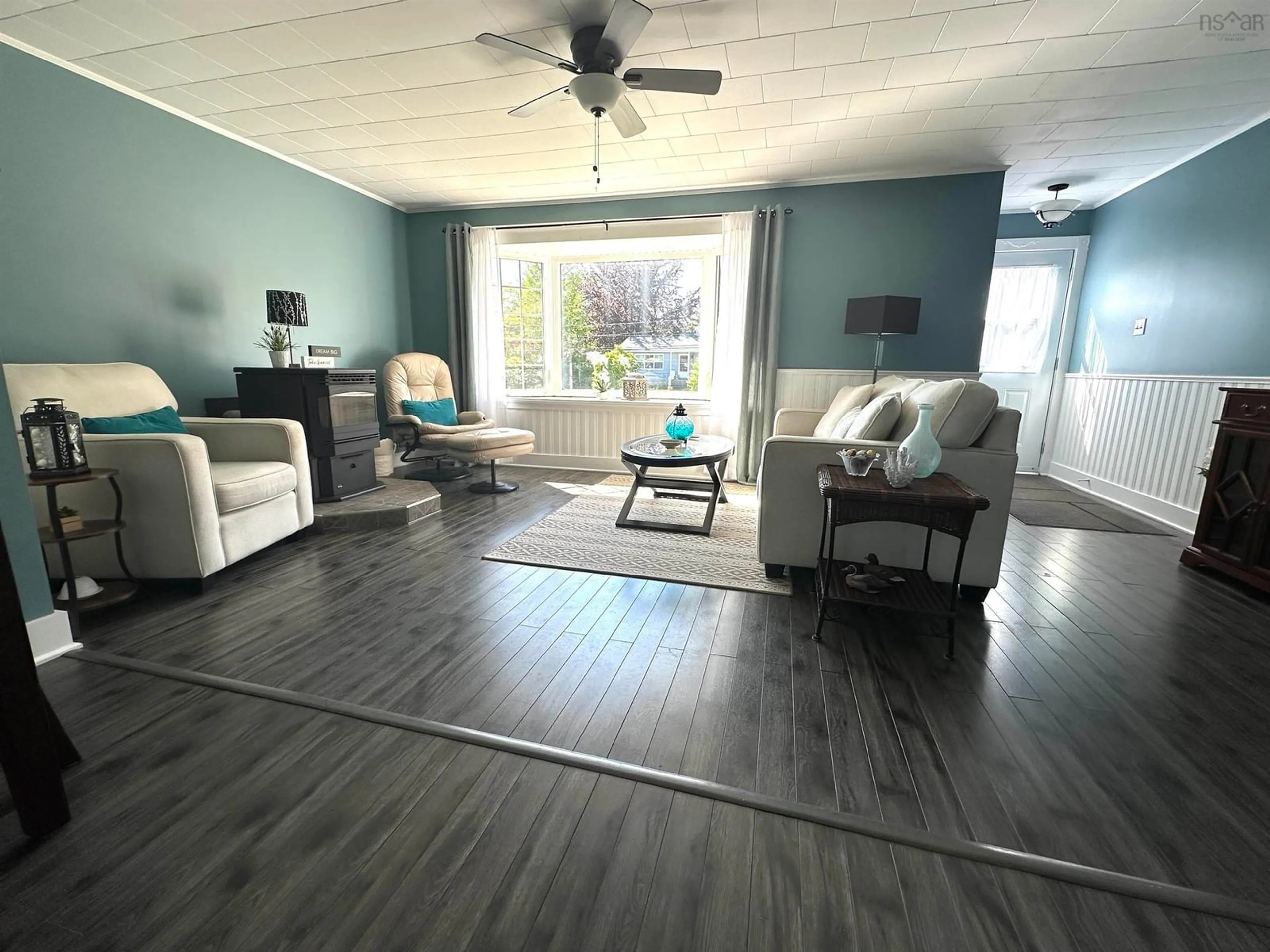 Living room with furniture, wood/laminate floor for 39 Barss St, Liverpool Nova Scotia B0T 1K0