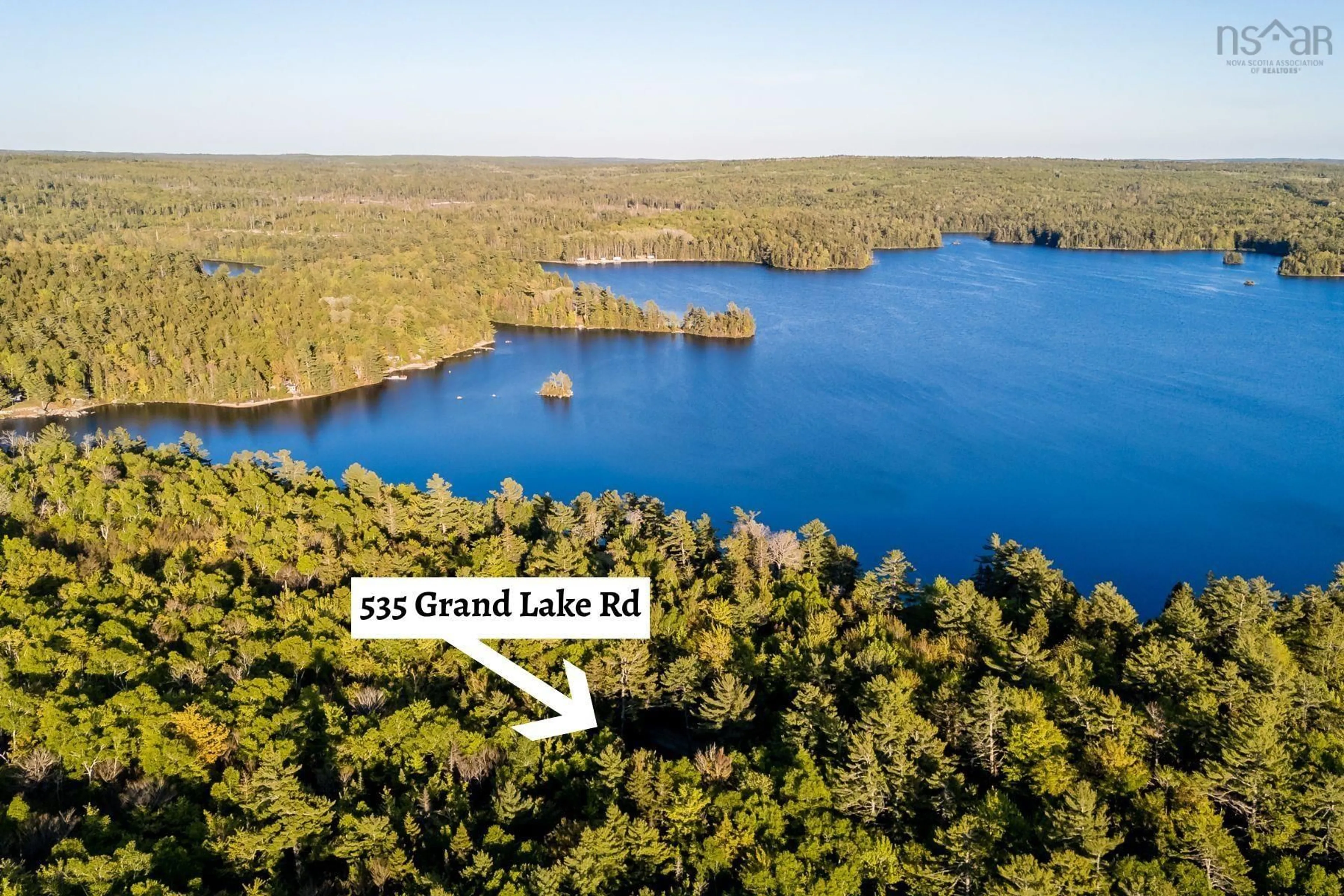 A pic from outside/outdoor area/front of a property/back of a property/a pic from drone, water/lake/river/ocean view for 535 Grand Lake Rd, Virginia East Nova Scotia B0S 0A6