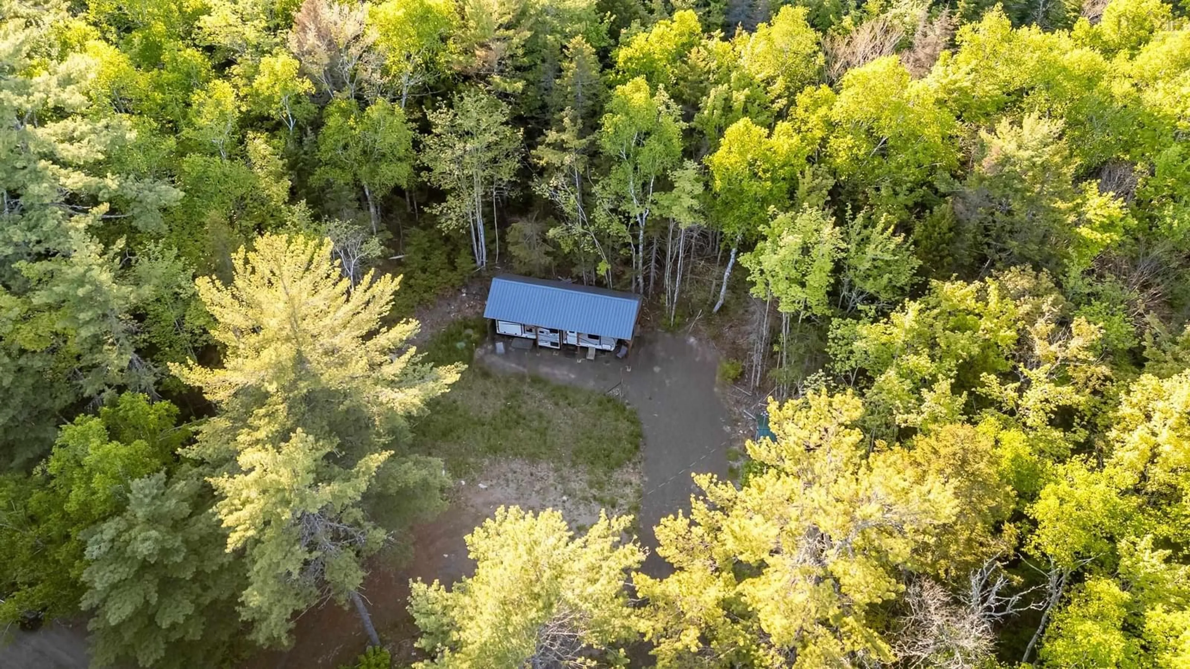 A pic from outside/outdoor area/front of a property/back of a property/a pic from drone, forest/trees view for 535 Grand Lake Rd, Virginia East Nova Scotia B0S 0A6