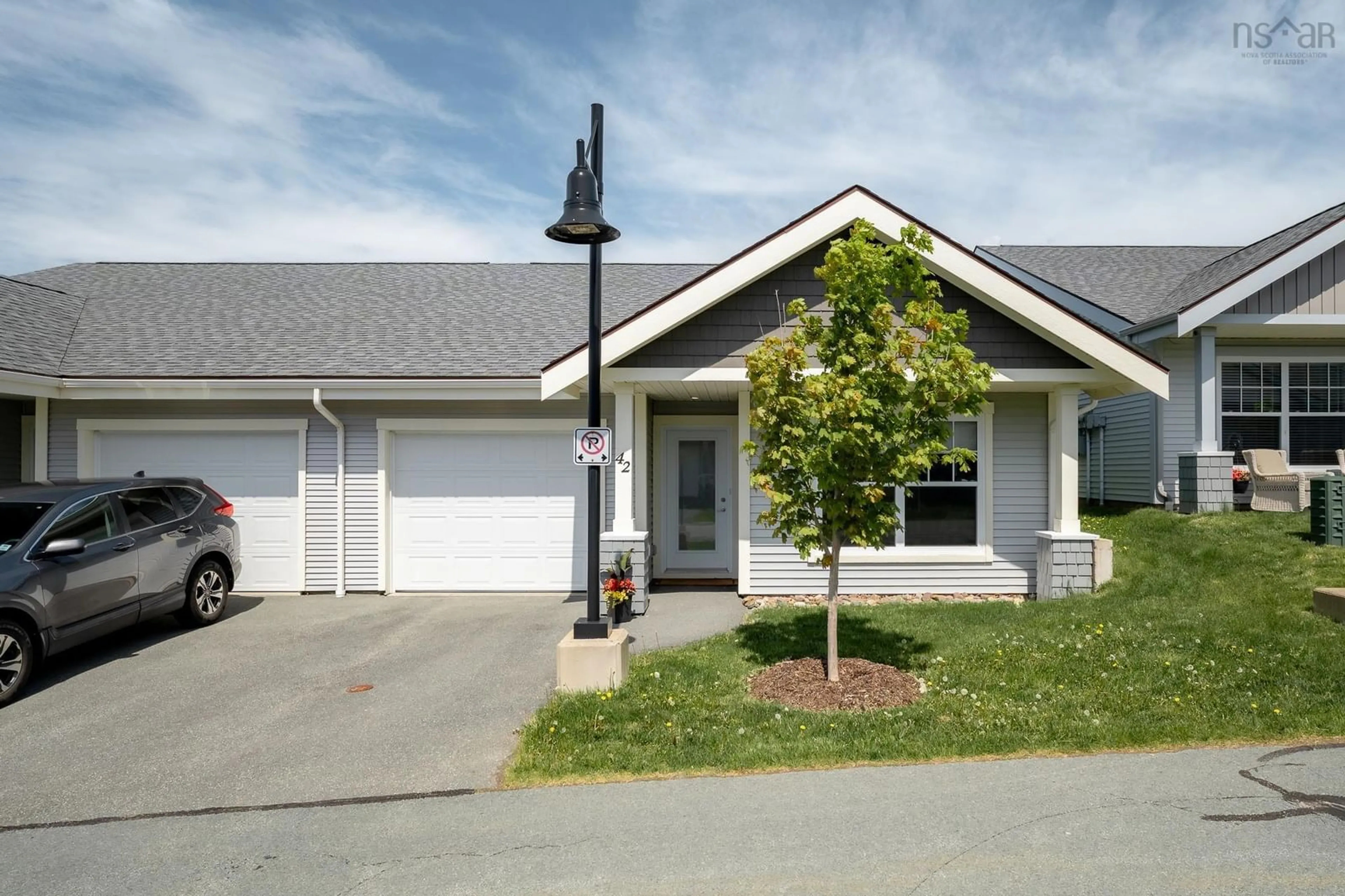 Home with vinyl exterior material, street for 42 Candytuft Close, Eastern Passage Nova Scotia B3G 0A3