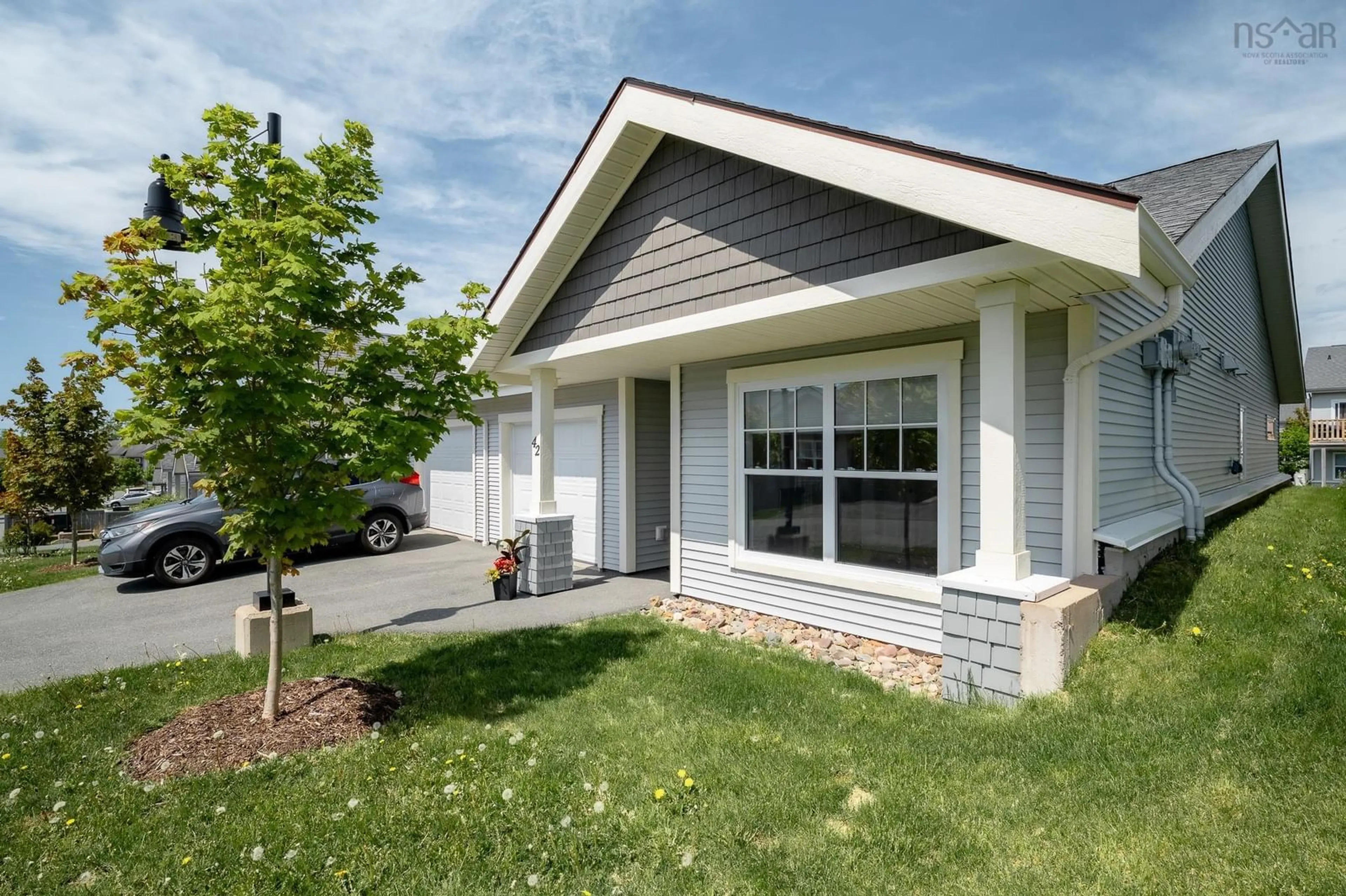 Home with vinyl exterior material, street for 42 Candytuft Close, Eastern Passage Nova Scotia B3G 0A3