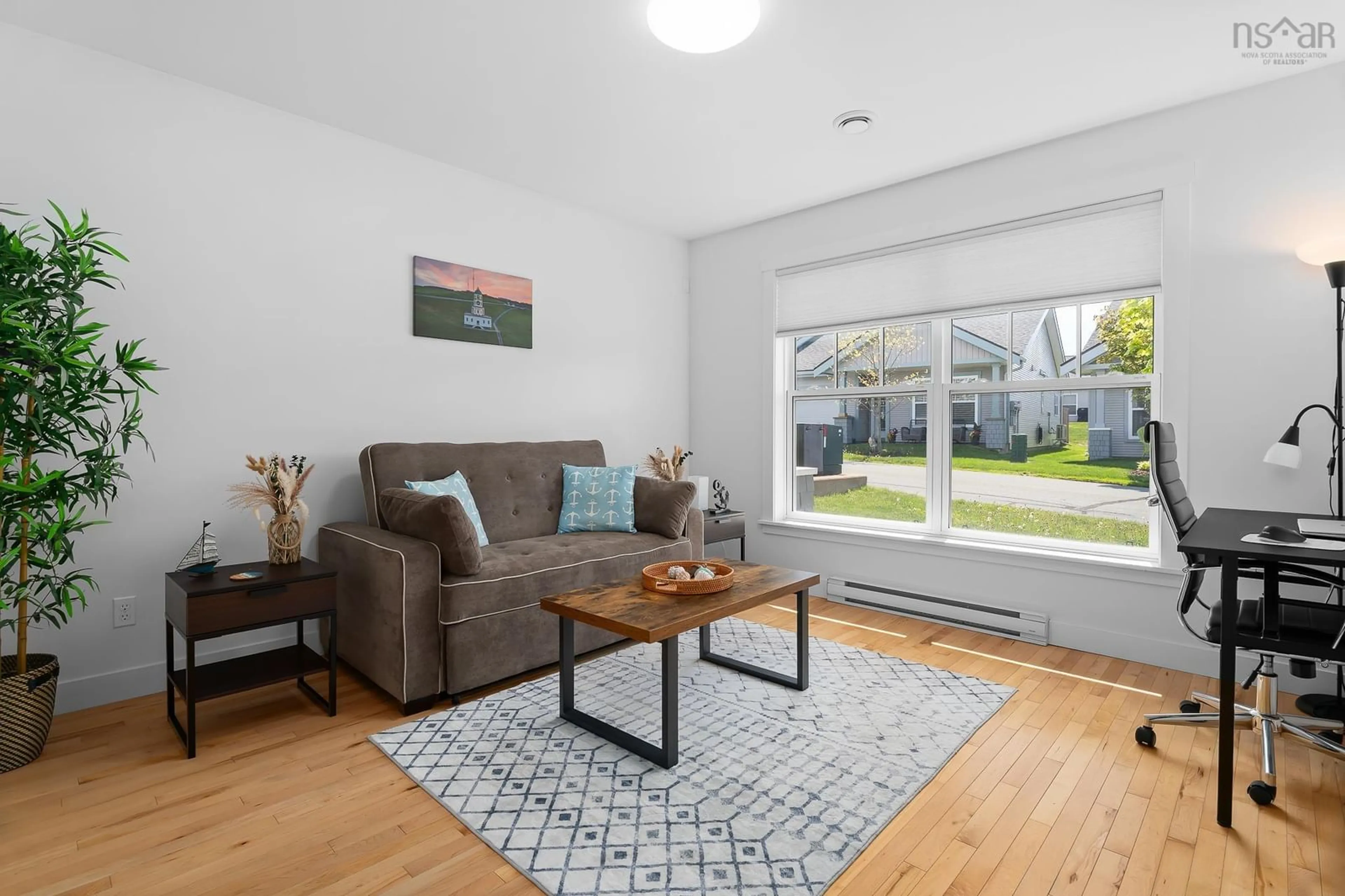 Living room with furniture, wood/laminate floor for 42 Candytuft Close, Eastern Passage Nova Scotia B3G 0A3