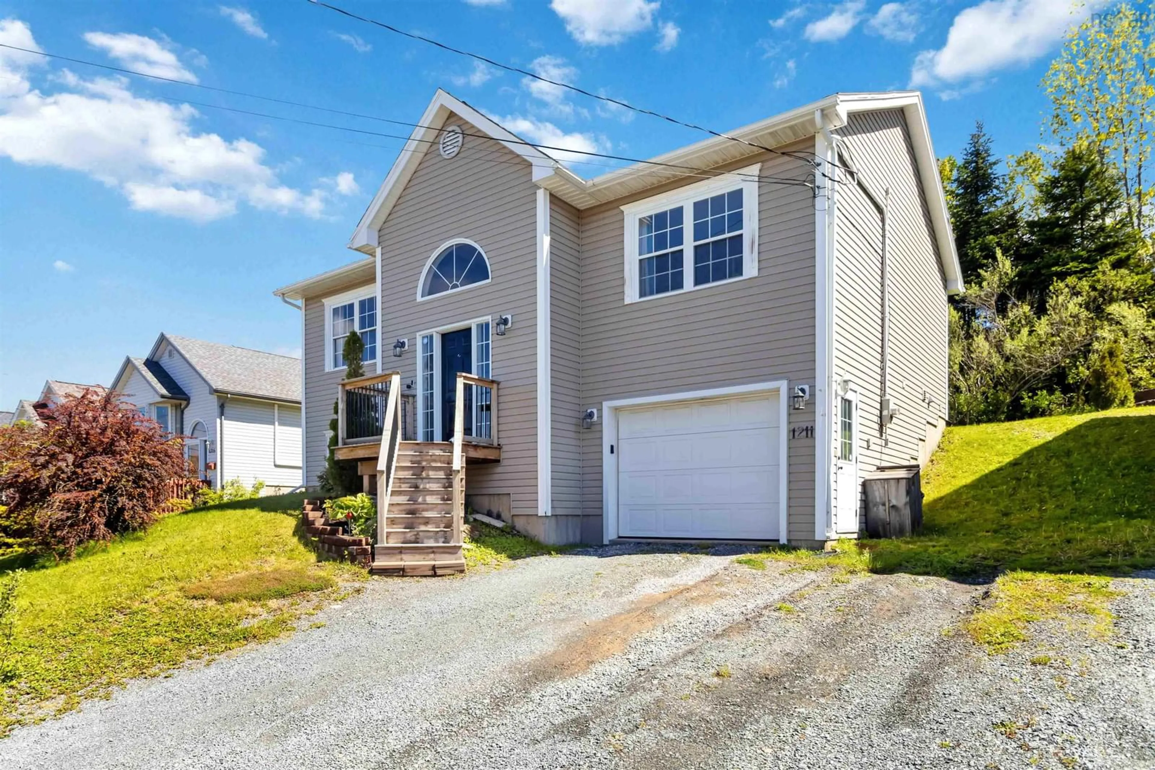 Home with vinyl exterior material, street for 1211 Sackville Dr, Middle Sackville Nova Scotia B4E 3G1