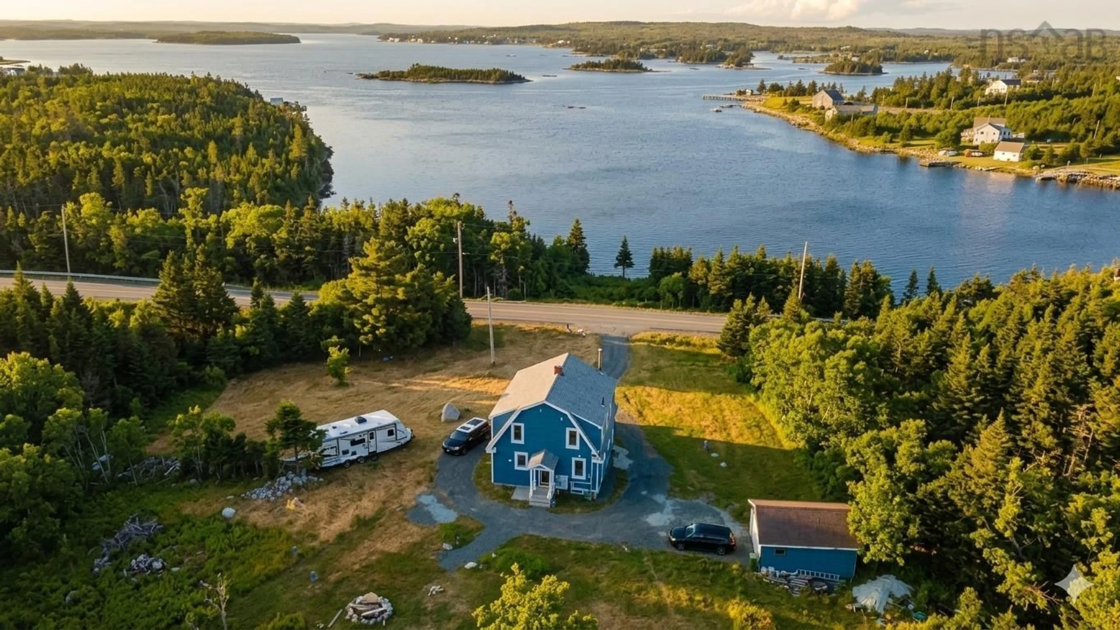 A pic from outside/outdoor area/front of a property/back of a property/a pic from drone, water/lake/river/ocean view for 2351 Ostrea Lake Rd, Ostrea Lake Nova Scotia B0J 2L0
