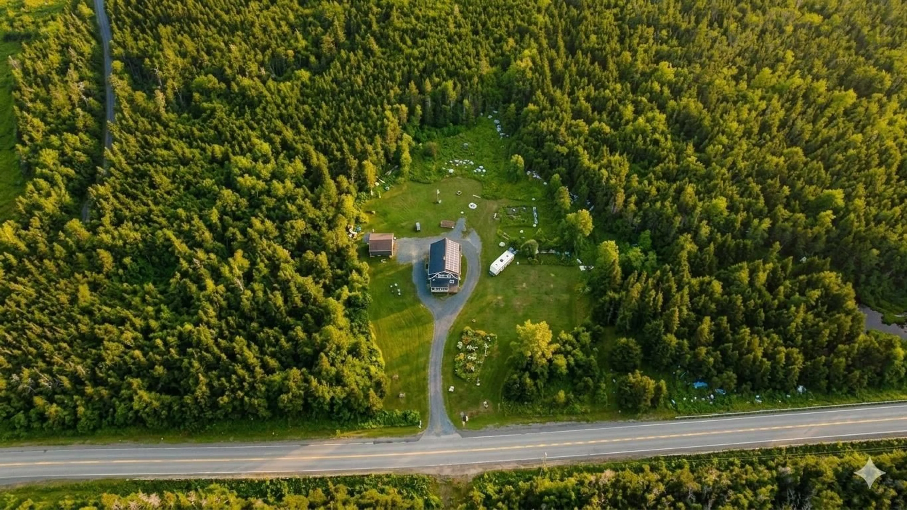 A pic from outside/outdoor area/front of a property/back of a property/a pic from drone, forest/trees view for 2351 Ostrea Lake Rd, Ostrea Lake Nova Scotia B0J 2L0