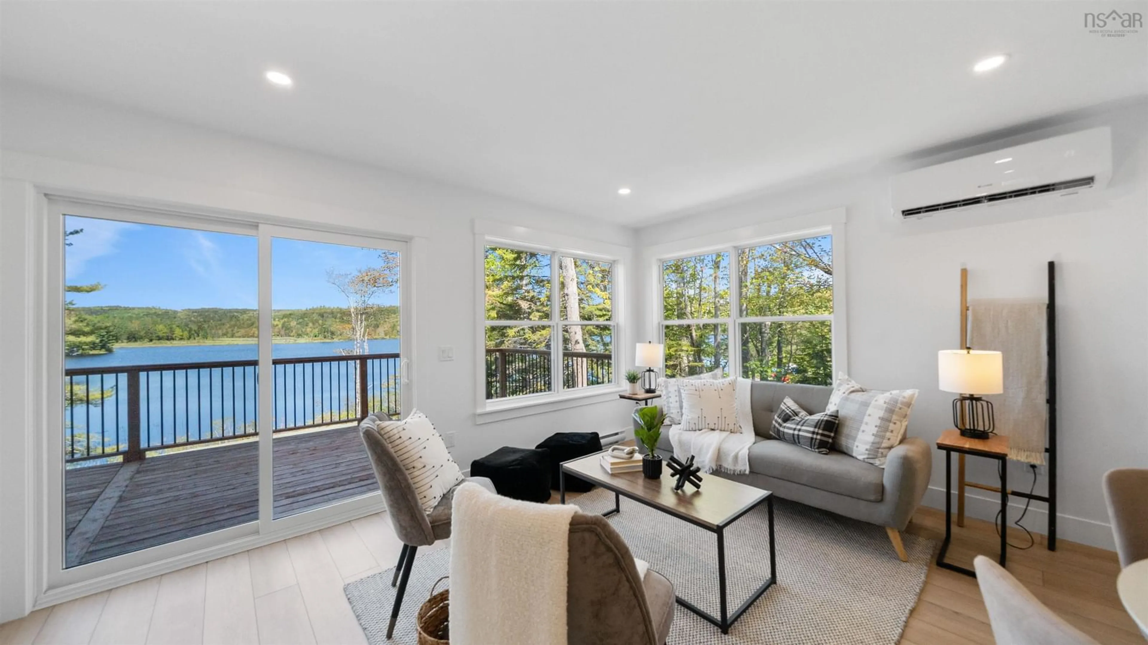 Living room with furniture, wood/laminate floor for 162 Goat Lake Rd, East Chester Nova Scotia B0J 1J0