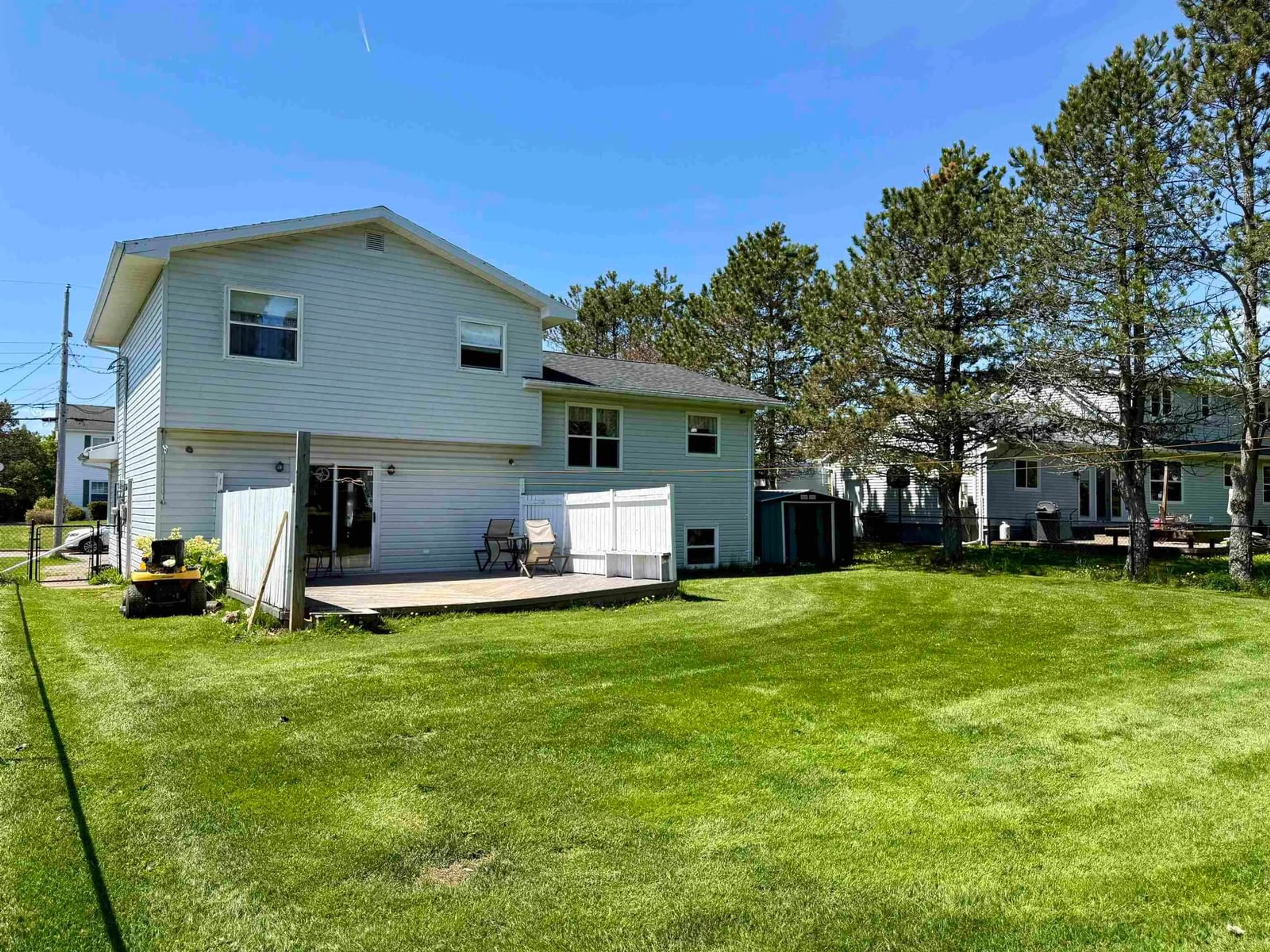 A pic from outside/outdoor area/front of a property/back of a property/a pic from drone, unknown for 18 Fletcher Dr, Amherst Nova Scotia B4H 4M4