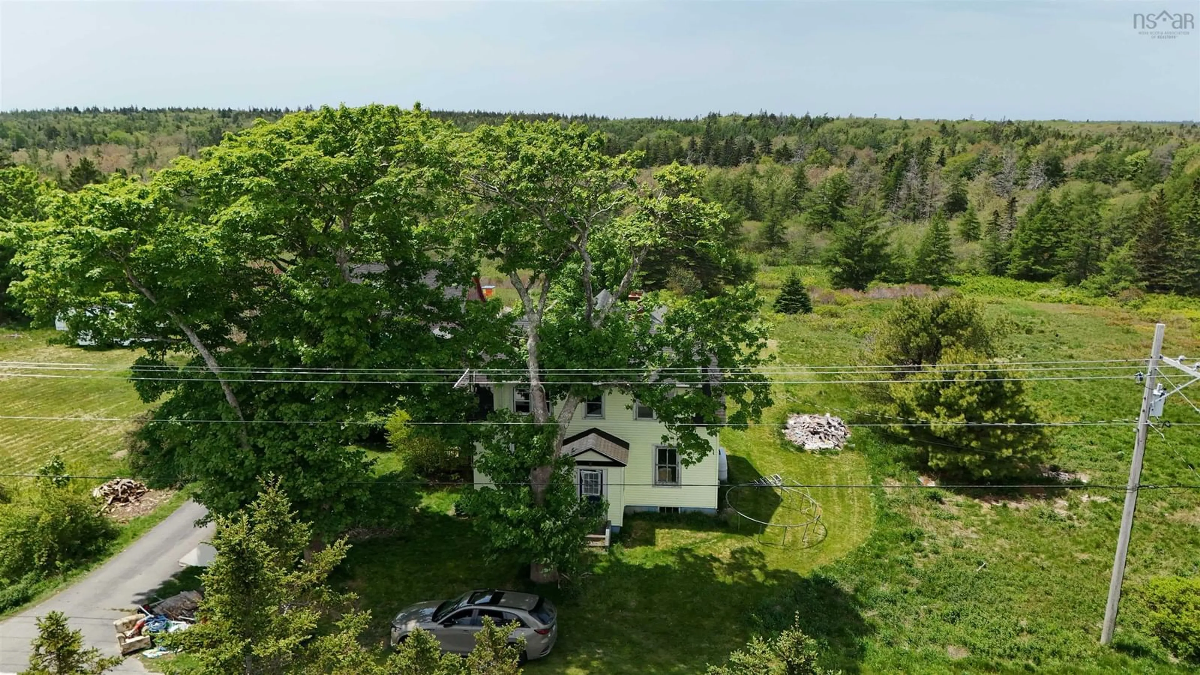 A pic from outside/outdoor area/front of a property/back of a property/a pic from drone, forest/trees view for 1641 1 Hwy, Wellington Nova Scotia B5A 5A6