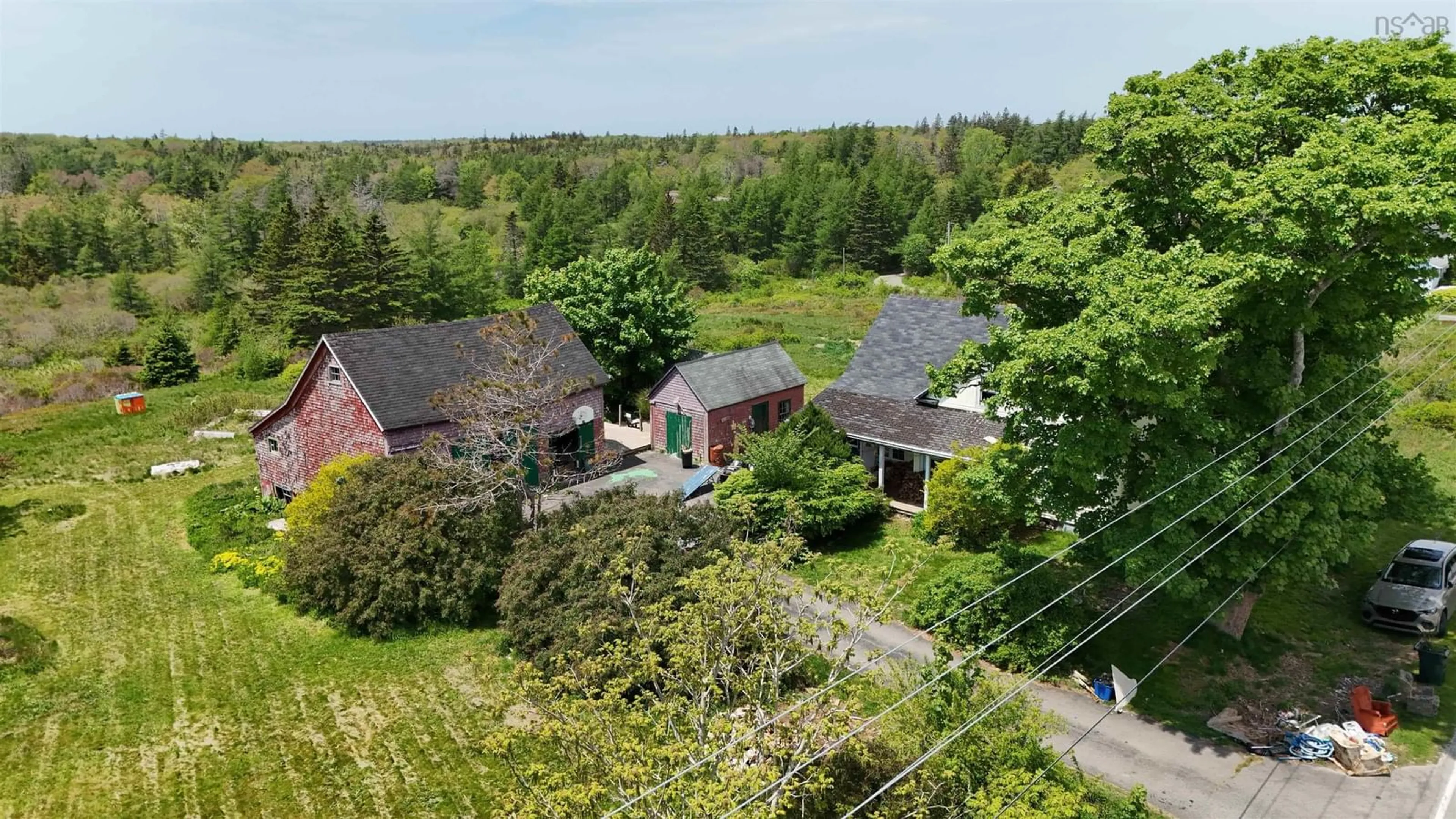 A pic from outside/outdoor area/front of a property/back of a property/a pic from drone, unknown for 1641 1 Hwy, Wellington Nova Scotia B5A 5A6